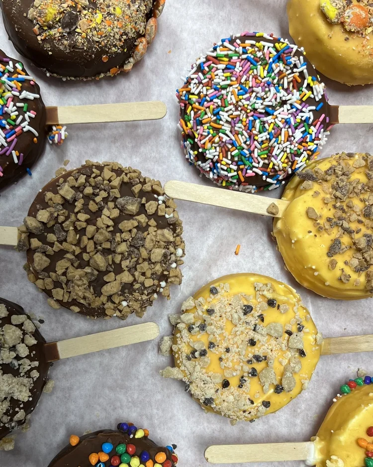 Chocolate and butterscotch Chillin&rsquo; Bars rolled in sprinkles, crunchy bits and candy at Merla-Mae Ice Cream in London, Ontario