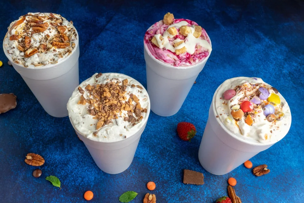 Four Cream Shake Flurries loaded with pecans, chopped toffee, a pink swirl and candy-coated chocolates at Merla-Mae Ice Cream in London, Ontario