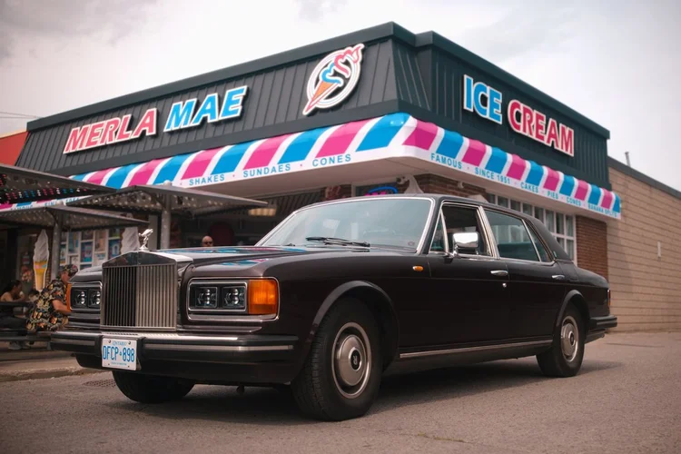 1982 Rolls-Royce Silver Spur parked outside Merla-Mae Ice Cream at the Chrome & Cones Car Show