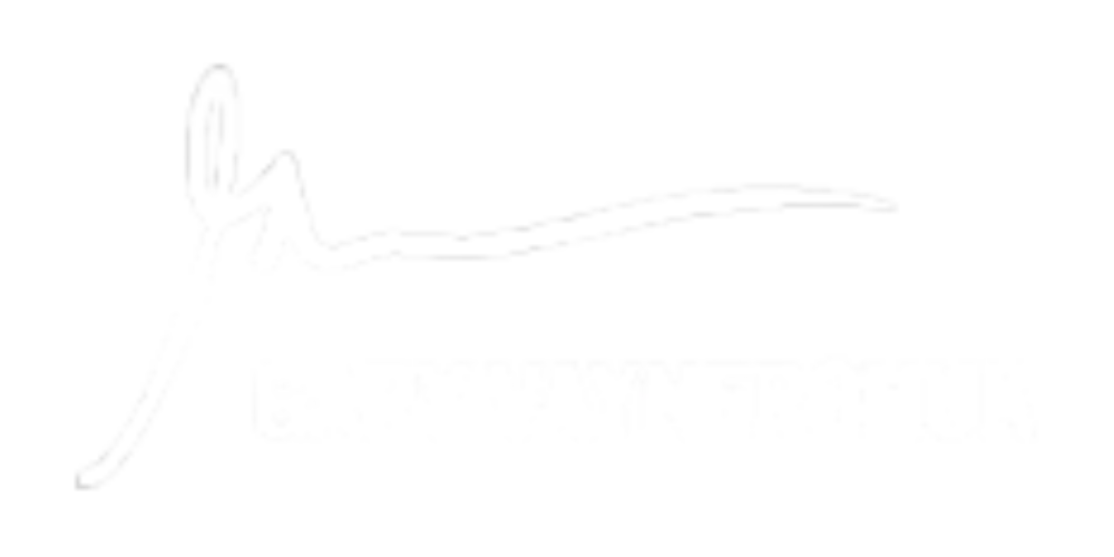 A logo with the word "Yogaworks" written in cursive font, with a stylized yoga pose figure above the text, set against a black background.