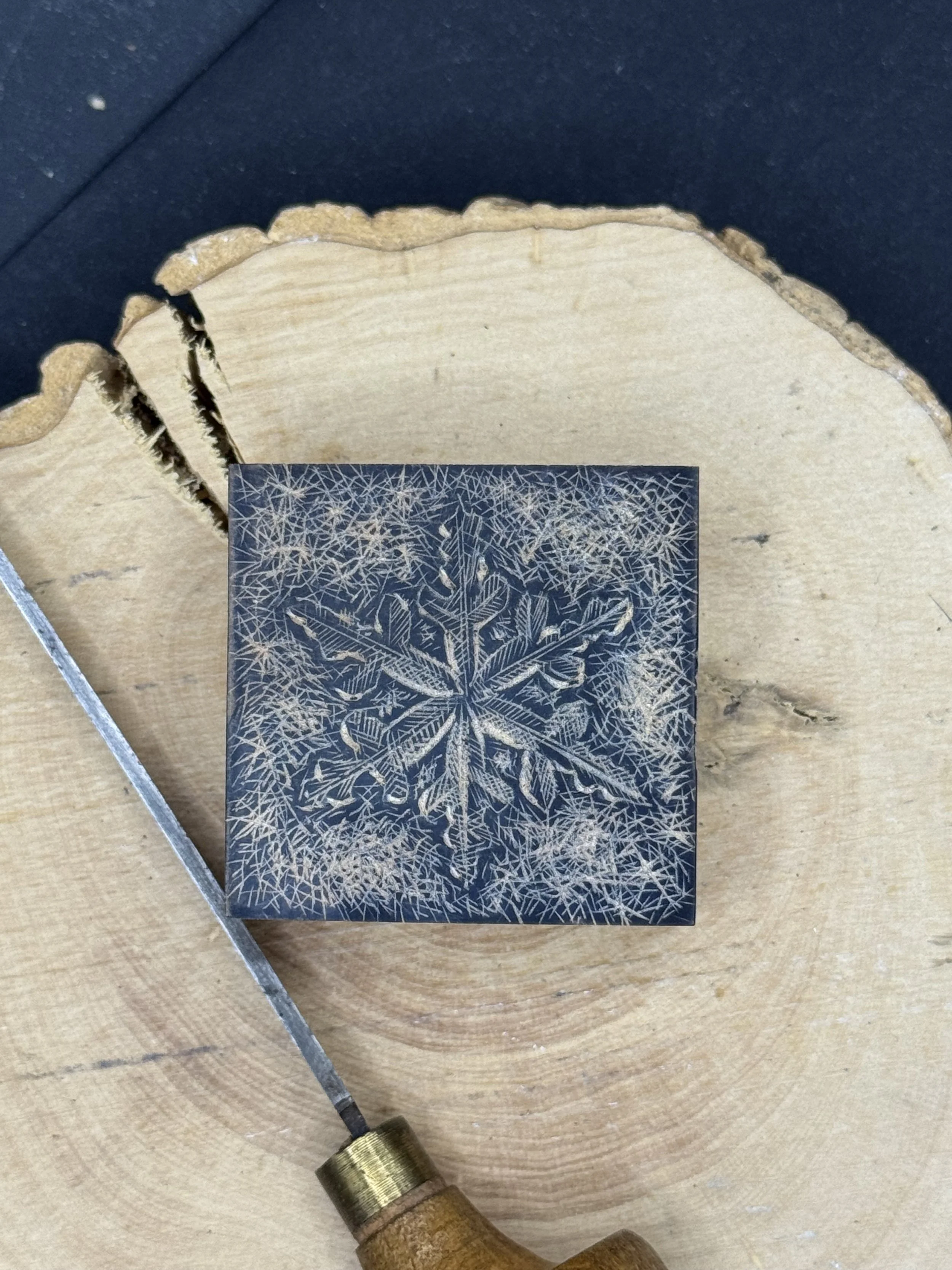 Snowflake wood engraved block