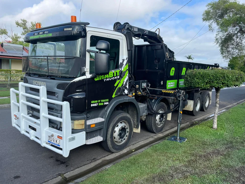 Grab truck ready for waste removal