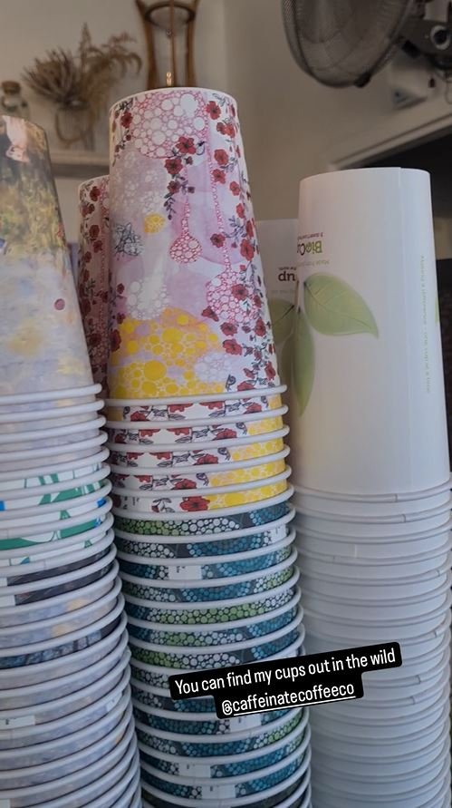 My cups stacked in Caffinate.JPG