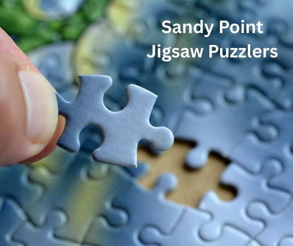 Sandy Point Jigsaw Puzzlers,
Are you one of the thousands of jigsaw puzzle  devotees worldwide? If you are, you will understand the quiet enjoyment of seeing a picture come together piece by piece &ndash; and the satisfaction of putting in the last p