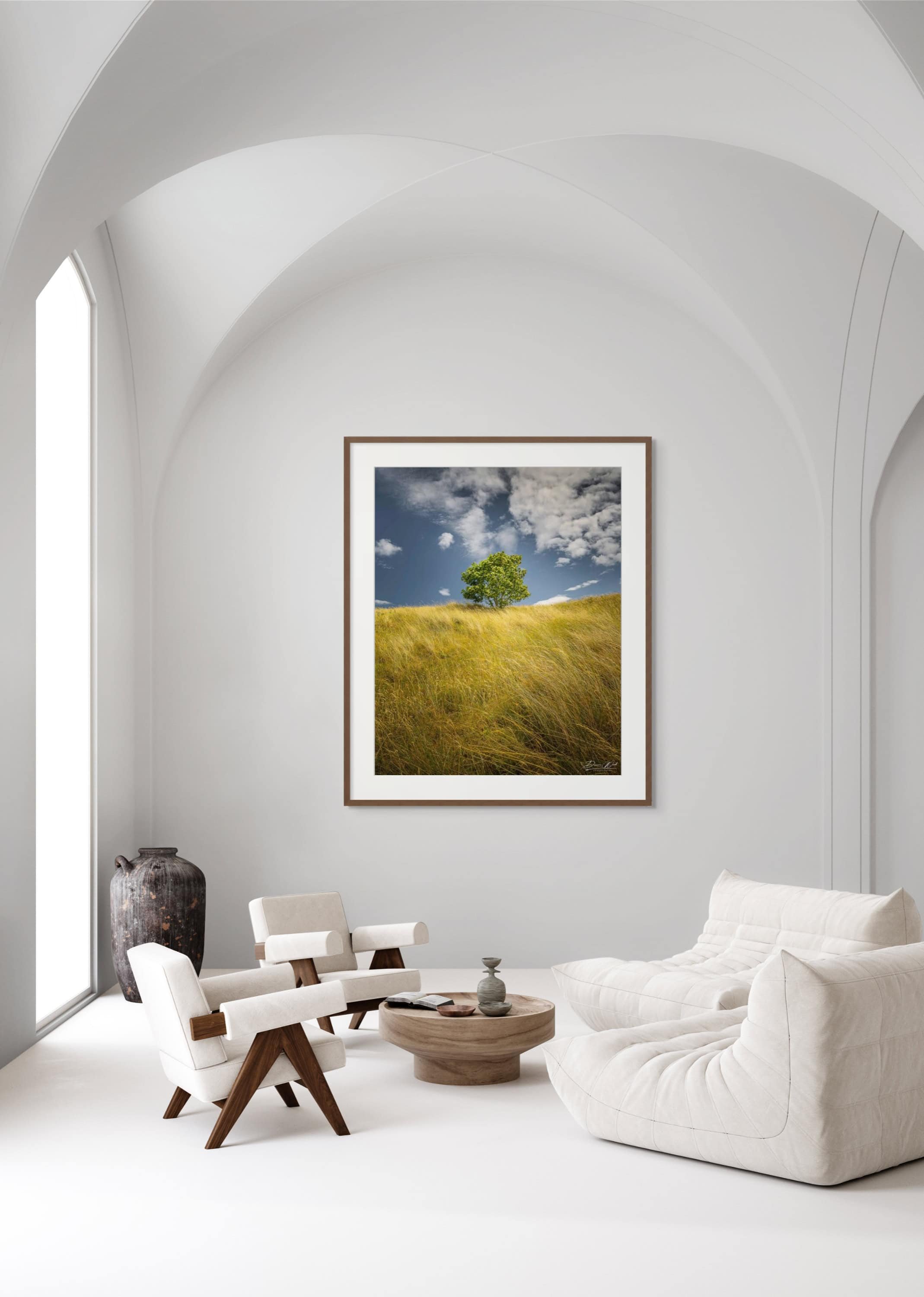 Framed print of Holding the Sky by Duncan Wood displayed on a wall. Scottish coastal photography featuring a lone tree and wide sky.