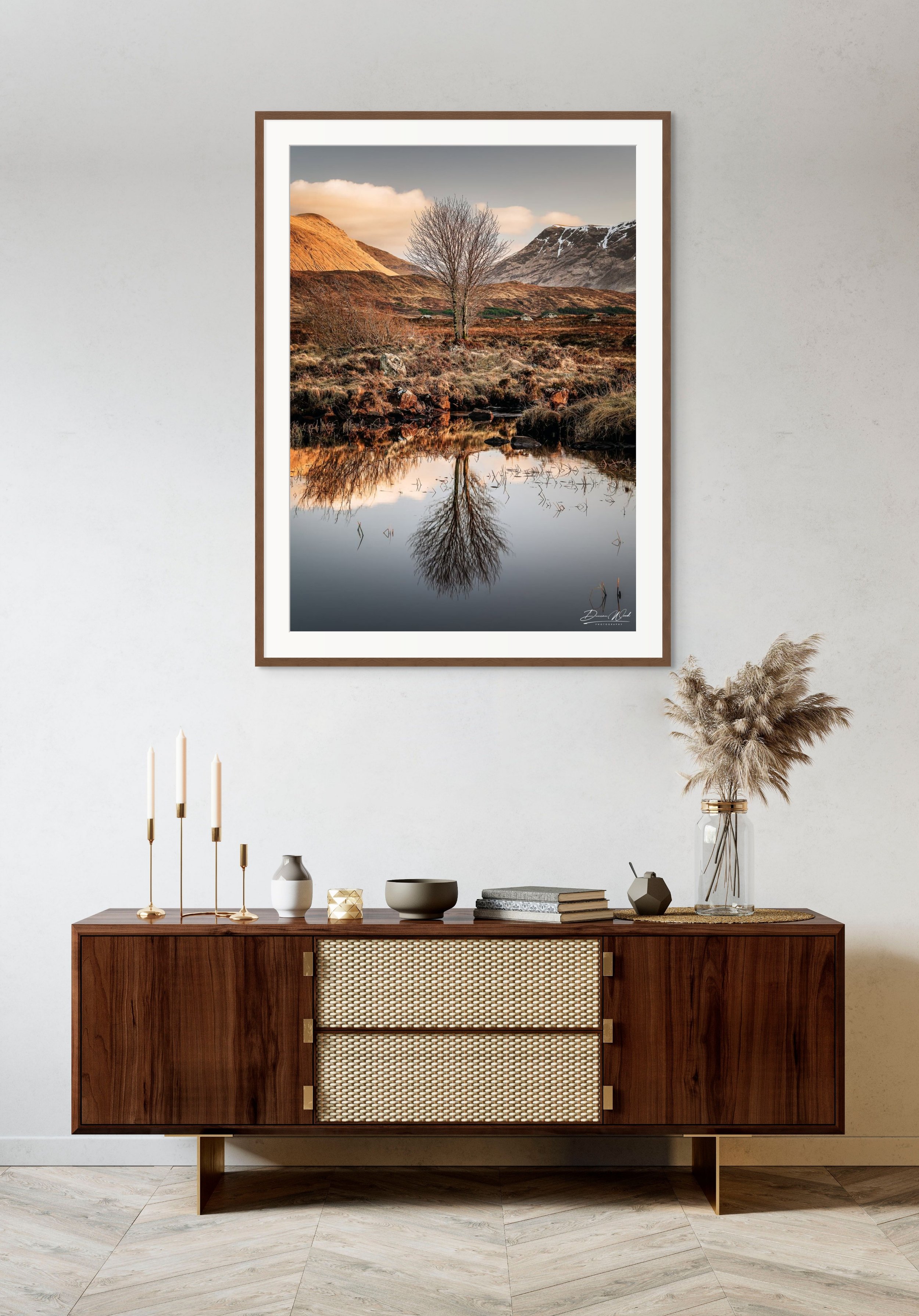 Framed print of Reflections on Rannoch by Duncan Wood displayed on a wall. Scottish landscape photography showing Rannoch Moor.