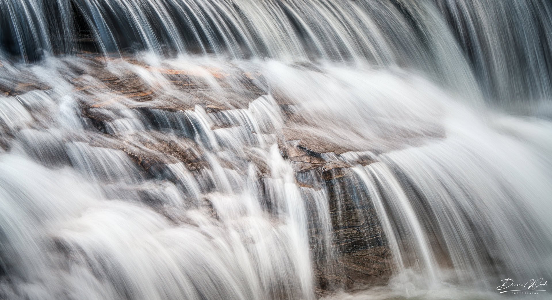 Abstract water motion at Linn of Dee, photographed by Duncan Wood in Scotland. Scottish nature photography.