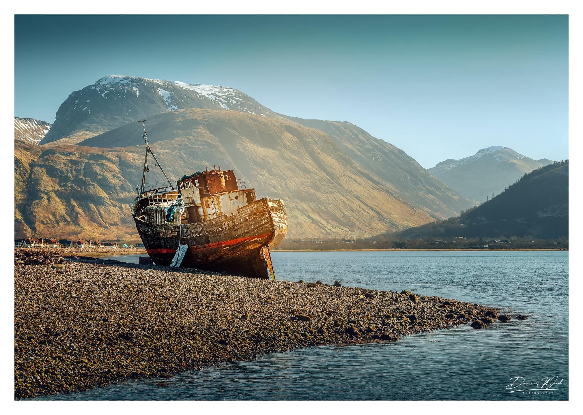 Corpach shipwreck beneath Ben Nevis, photographed by Duncan Wood in Scotland. Scottish landscape photography.