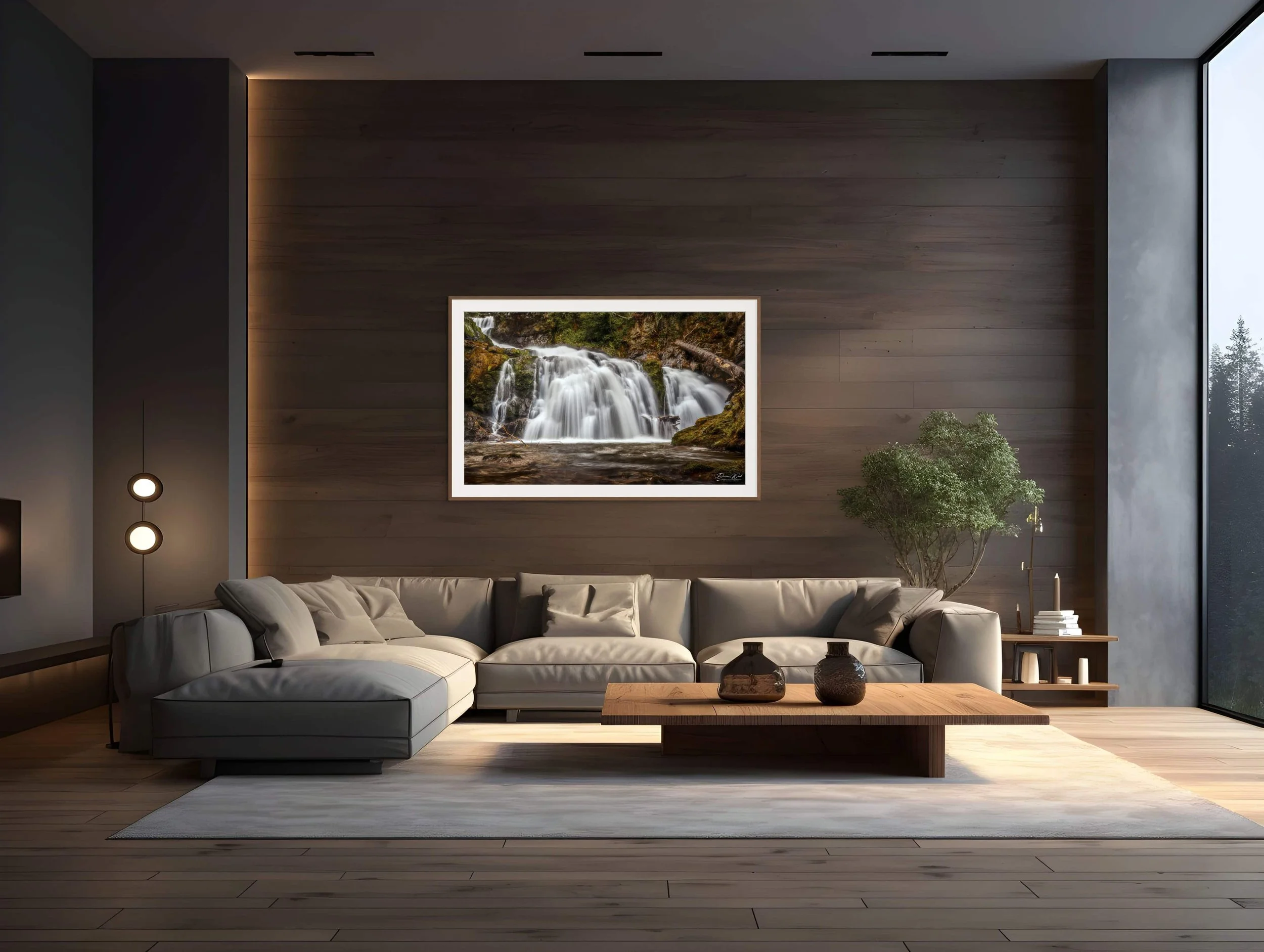Framed Scottish waterfall photography print displayed in a modern living room.
