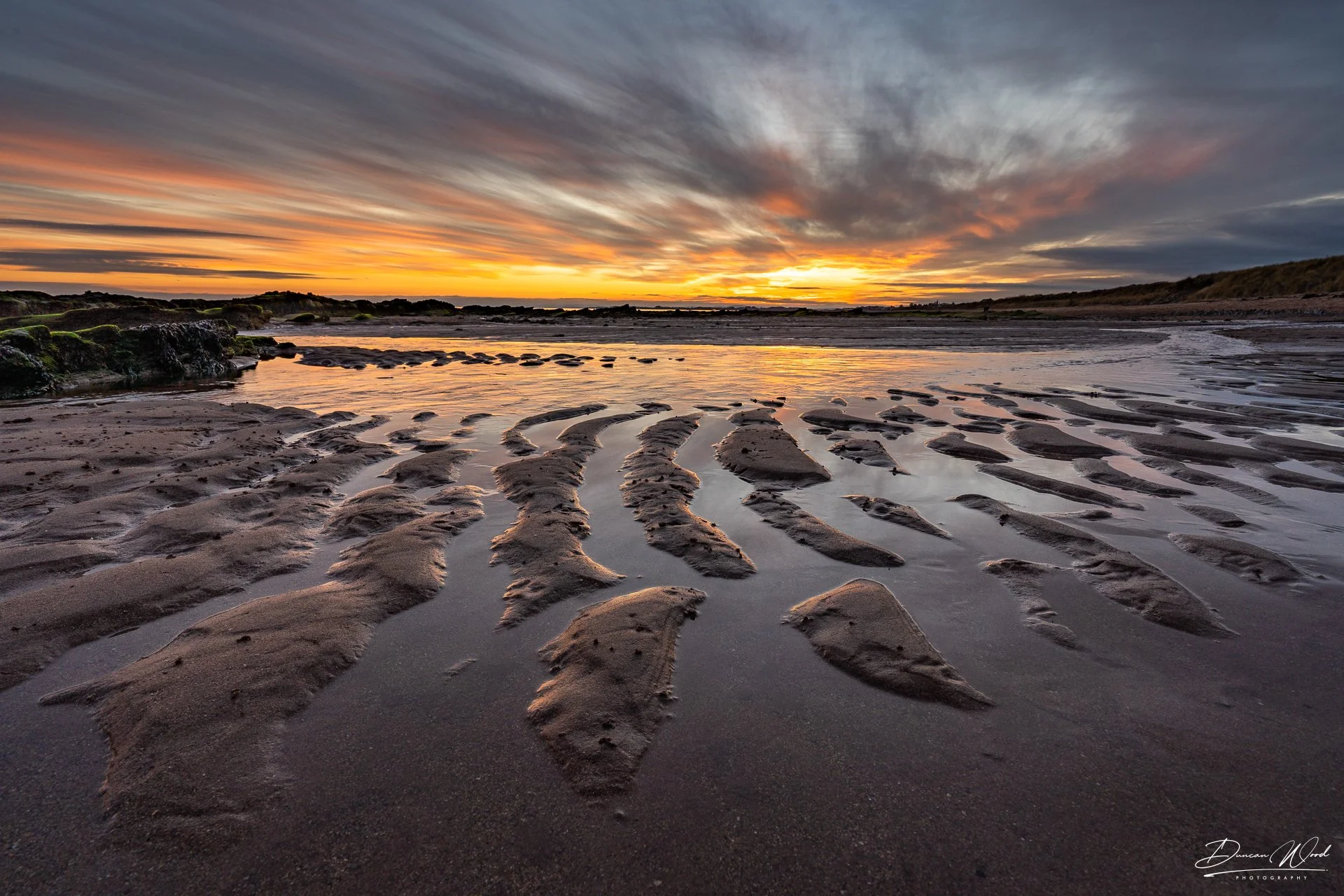 Sand patterns and sunset light at East Haven Beach on the Angus coast, representing East Coast photography subjects.