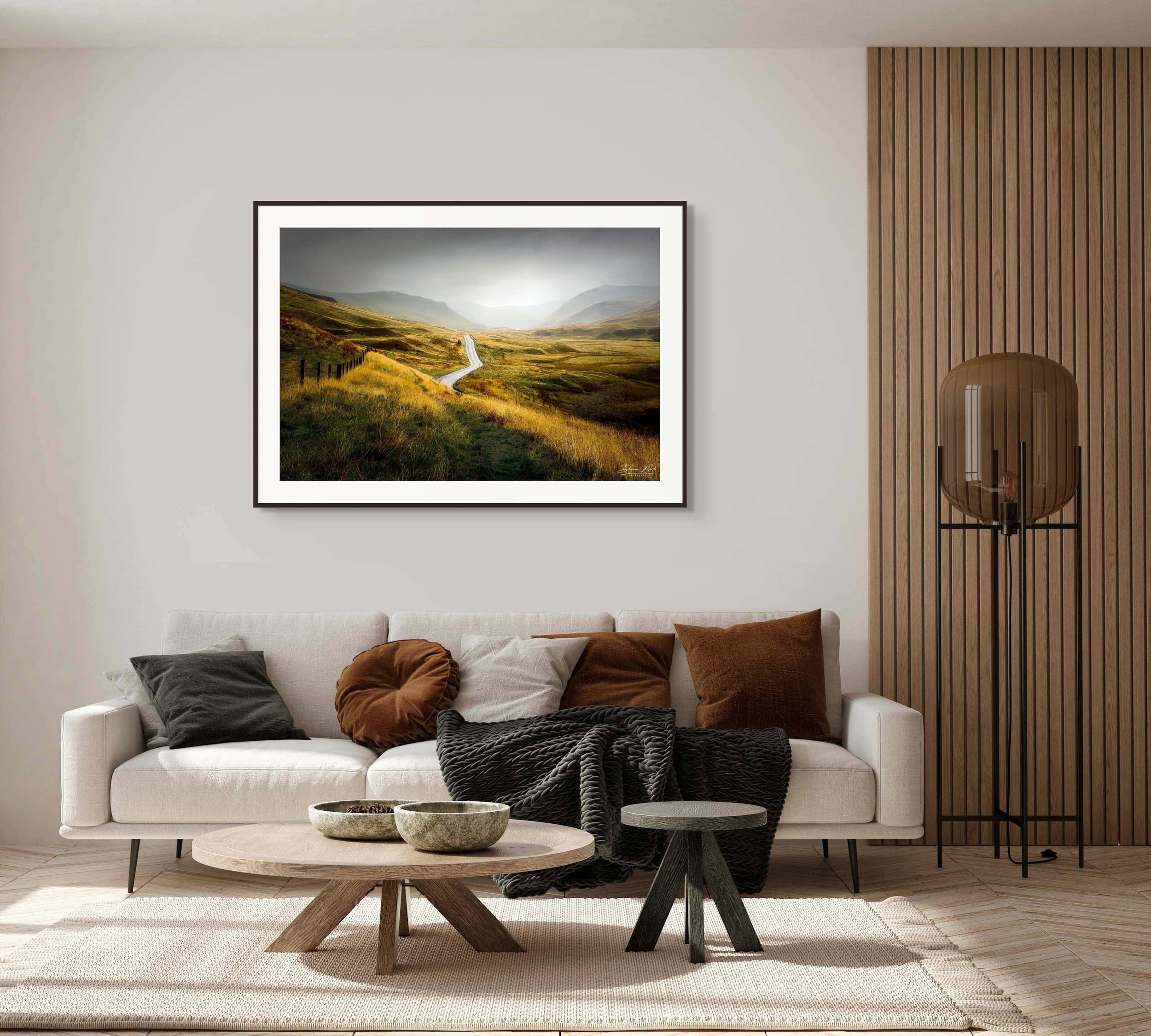 Framed print of Winding Through Gold by Duncan Wood displayed on a wall. Scottish landscape photography showing Glen Shee.