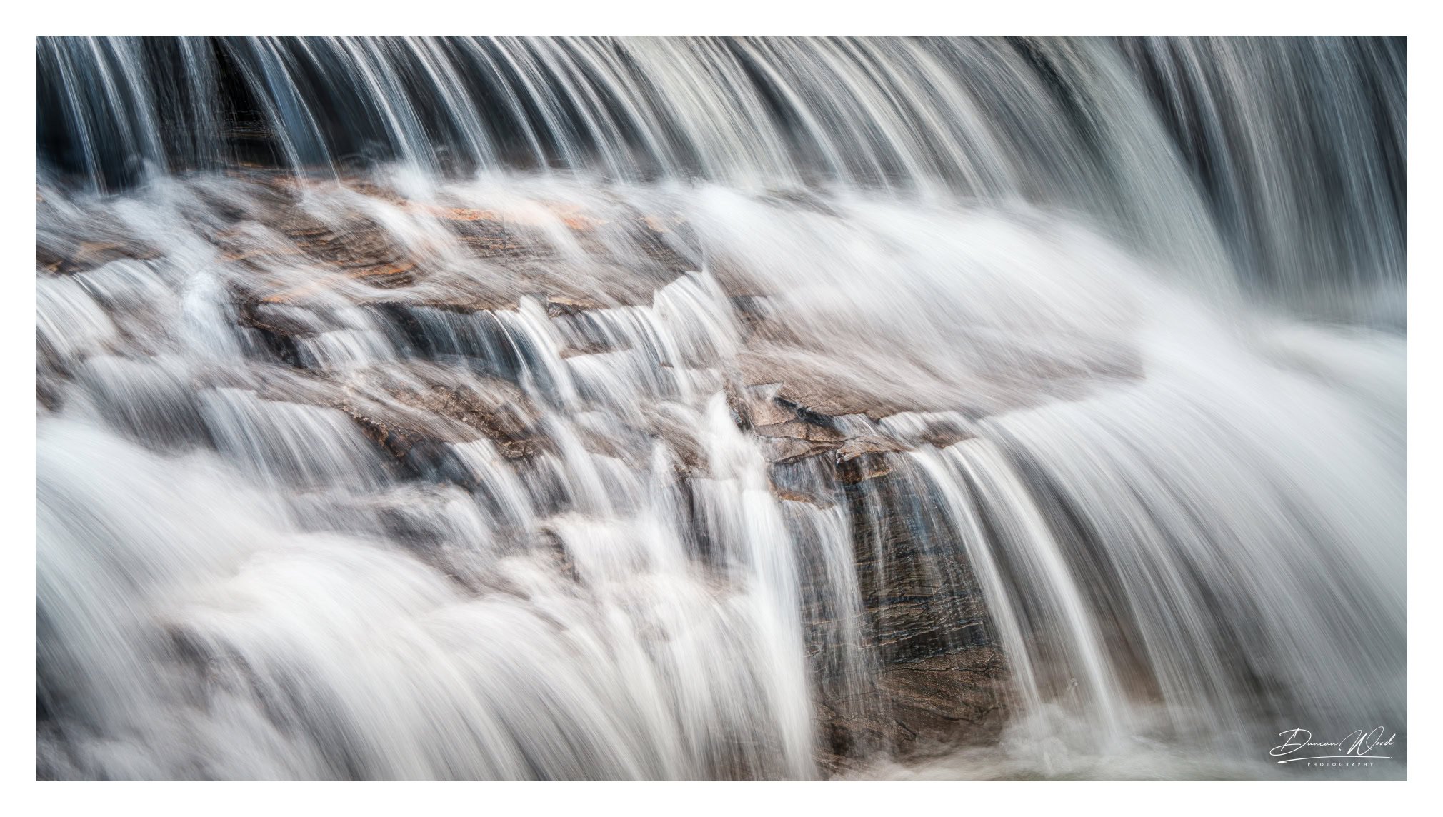 Abstract water motion at Linn of Dee, photographed by Duncan Wood in Scotland. Scottish nature photography.