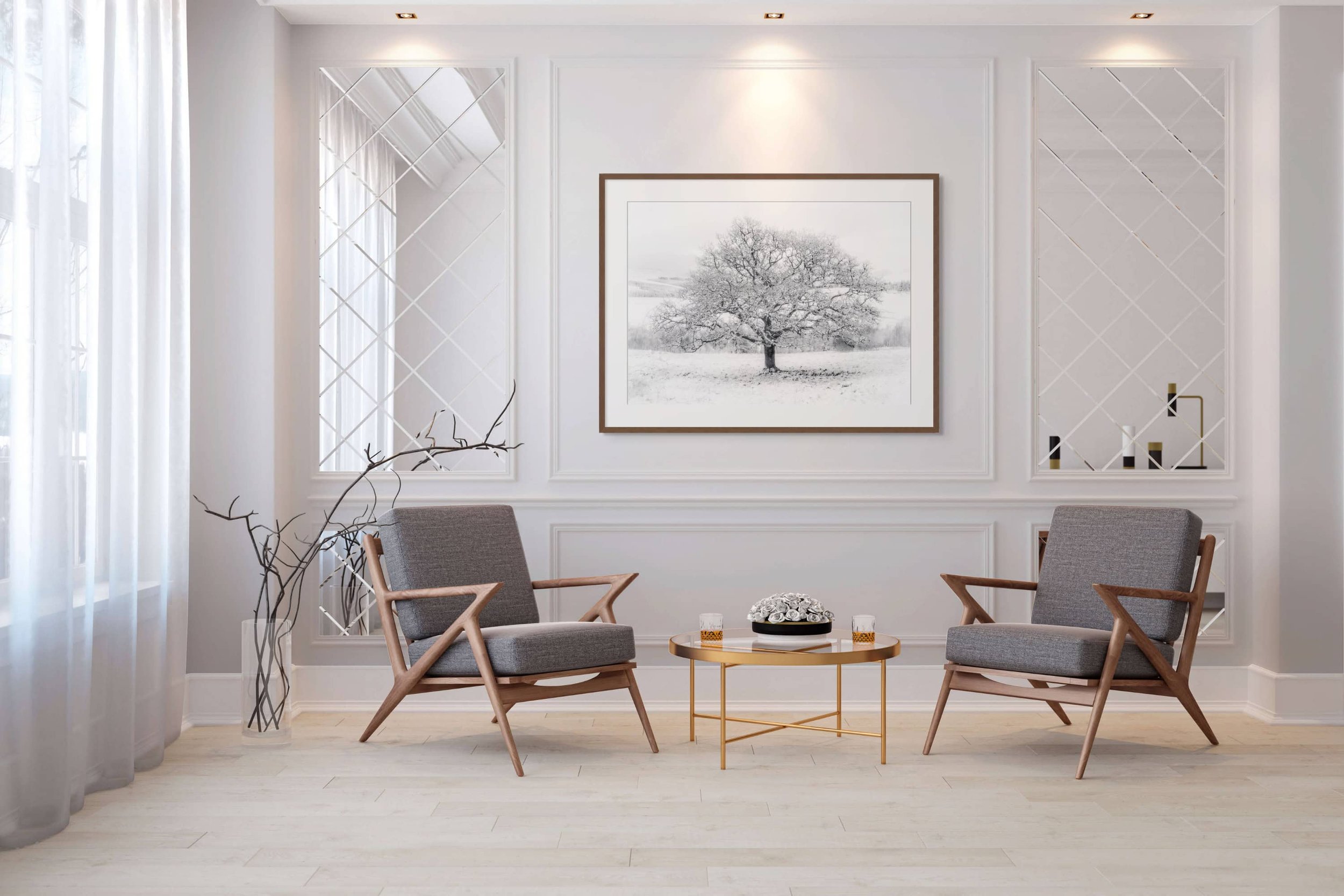 Framed print of White Silence by Duncan Wood displayed on a wall. Scottish black and white photography of a lone tree in snow.