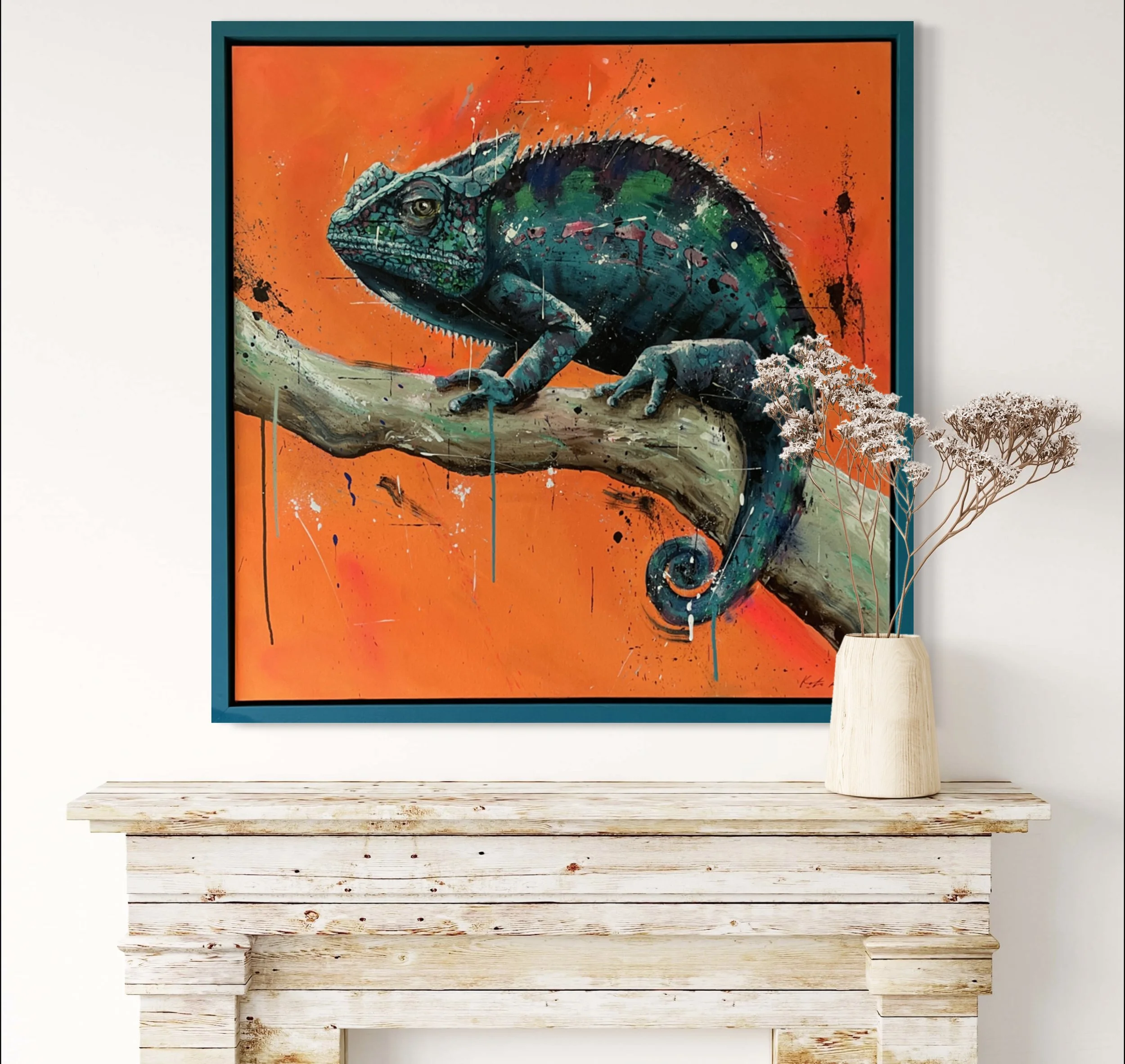Good Karma Chameleon, 2024. Acrylic on canvas. 90x90cm, framed in teal woodgrain. 
