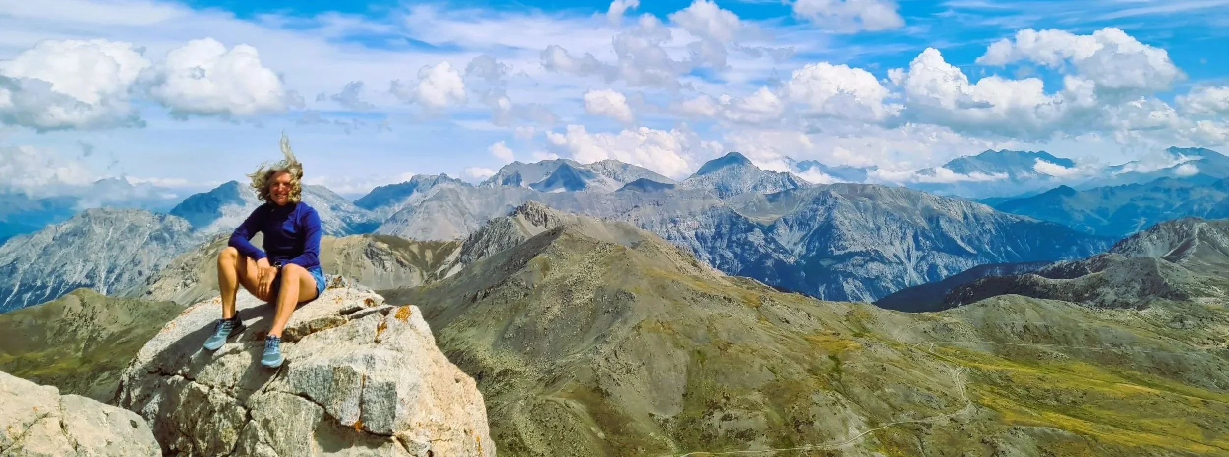 Sarah Eglin of Eglin Health, sat atop the summit of the Grand Area mountain in Serre Chevalier, France | Prioritising her health and longevity