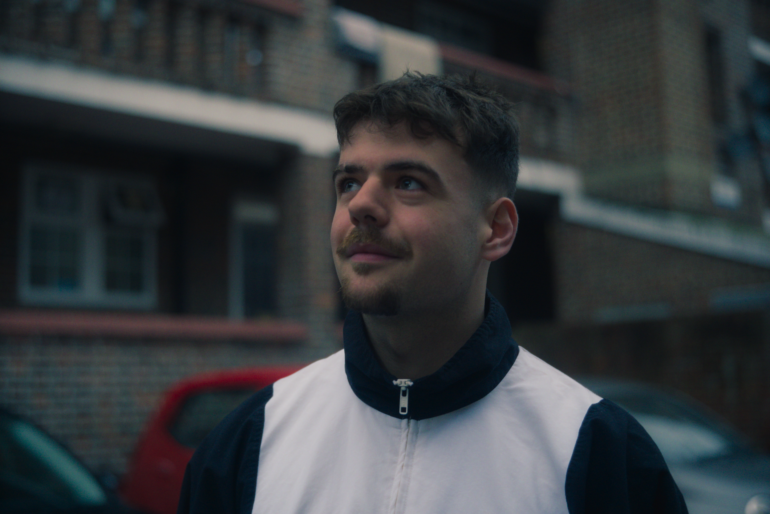 Midnight Bloom - Aaron Outside Flat.png