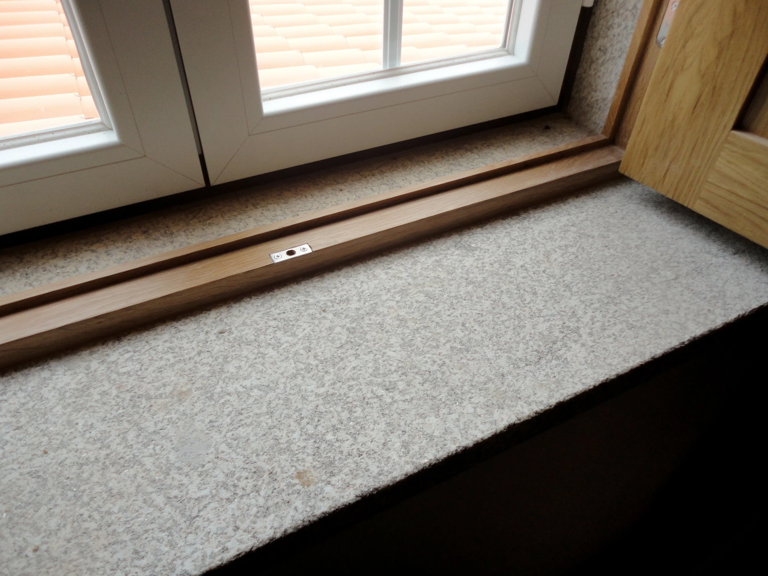 Original stone house window preserved in the renovation of a home in Cebolais de Cima