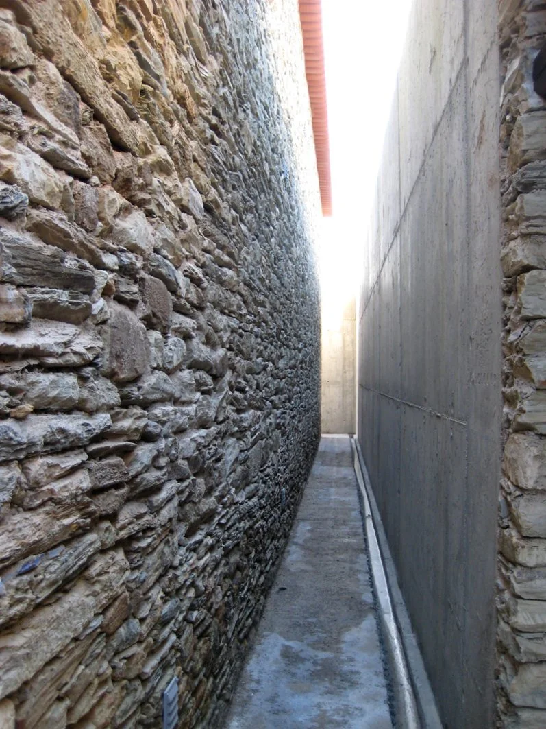 Detail of an original schist stone wall in a renovated house in Cebolais de Cima