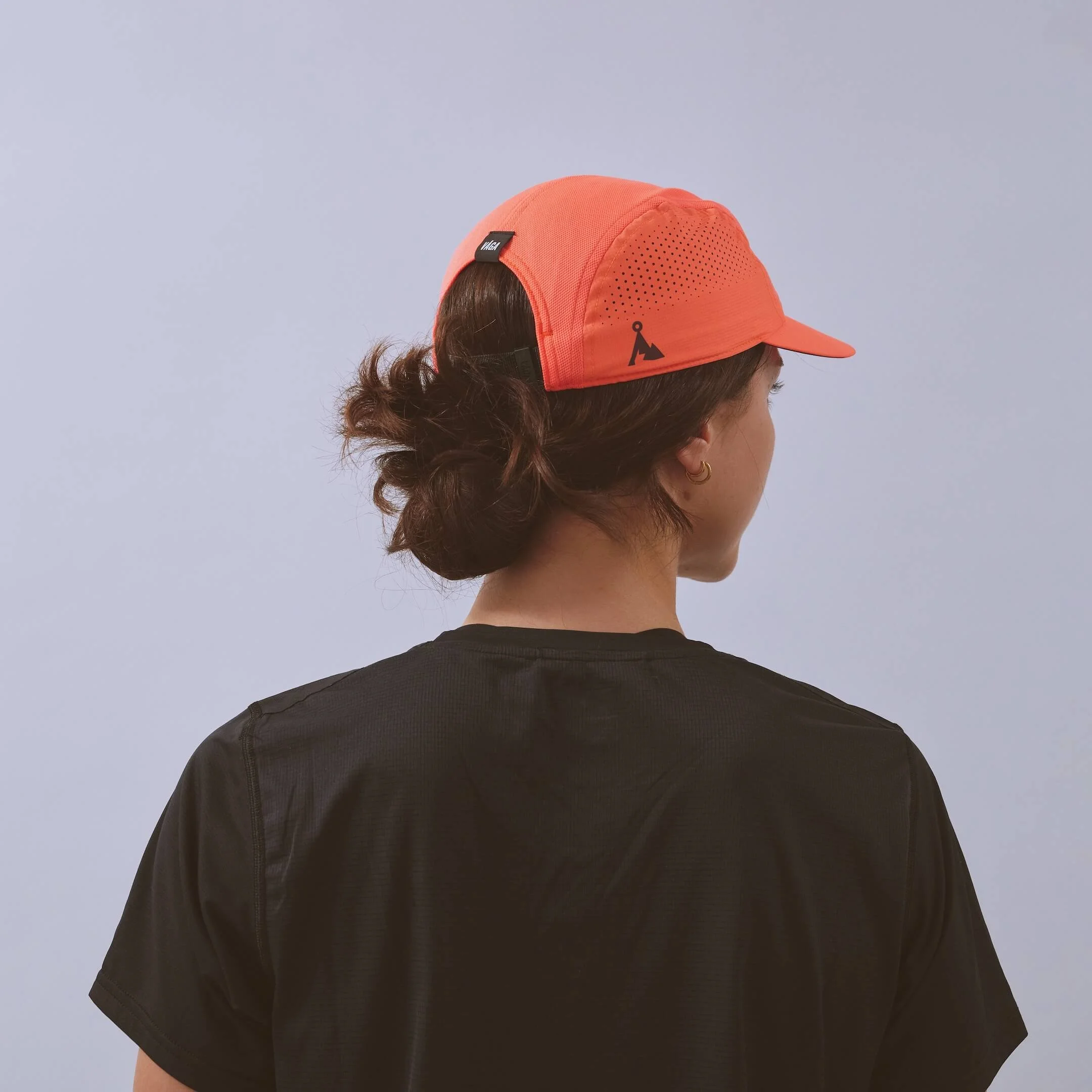 vaga-feather-racing-cap-neoncoral-model-back-angle.jpg