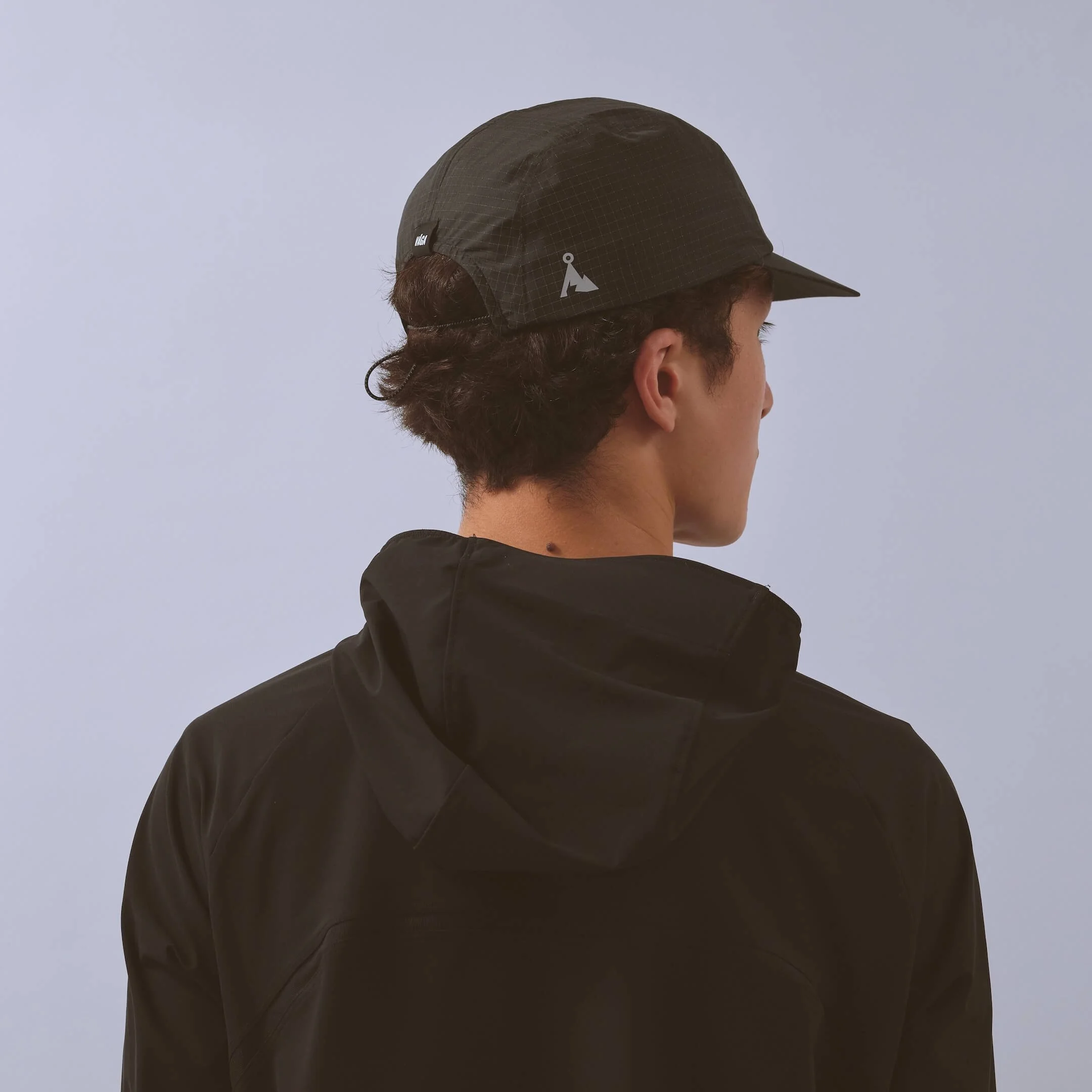 vaga-night-club-running-cap-black-model-back-angle.jpg