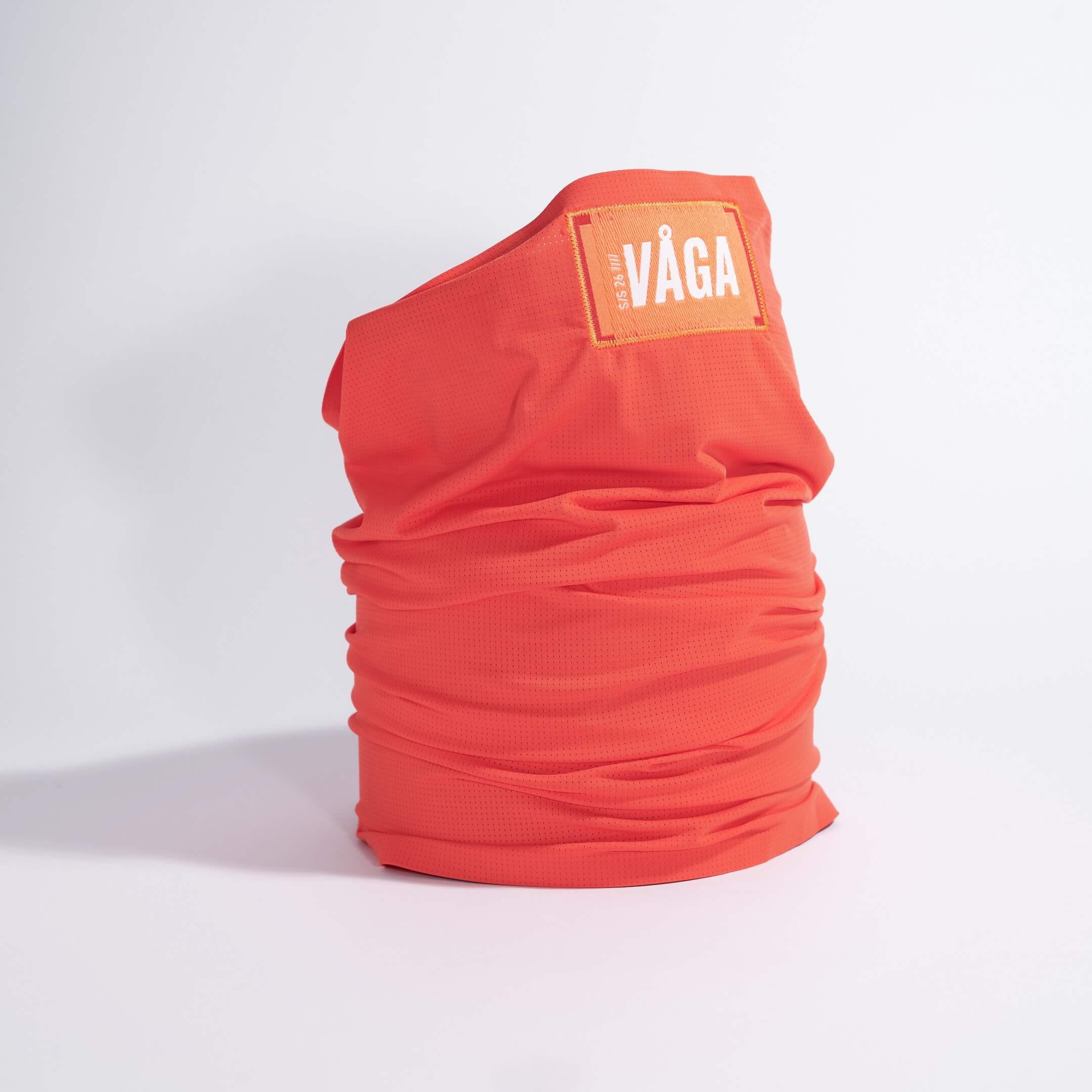 vaga-lightweight-mesh-running-neck-gaiter-neonpeach-stood.jpg
