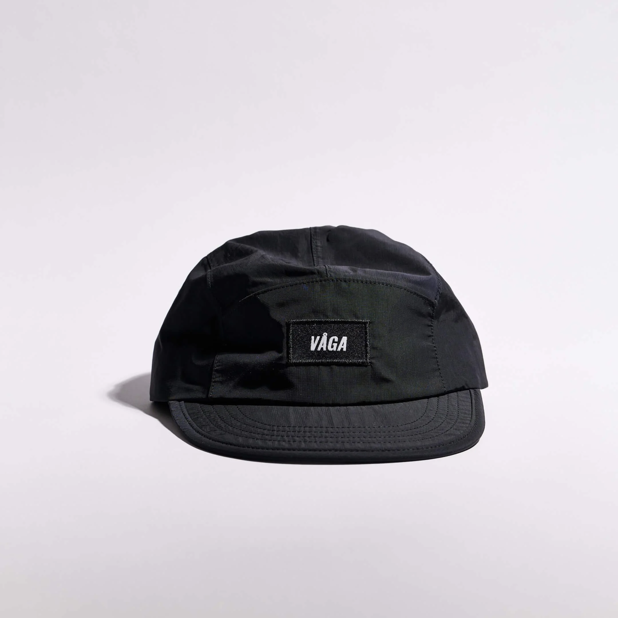 vaga-pacer-cap-running-cap-black-front.jpg