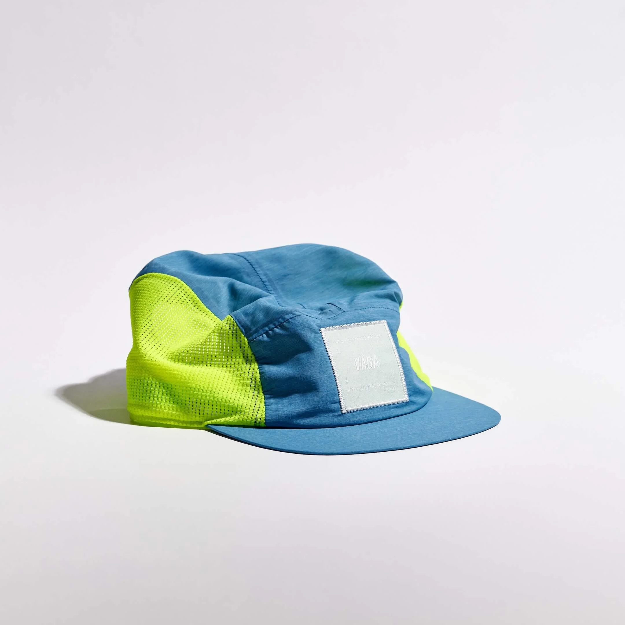 vaga-mesh-flex-running-cap-teal-neonyellow-angle.jpg