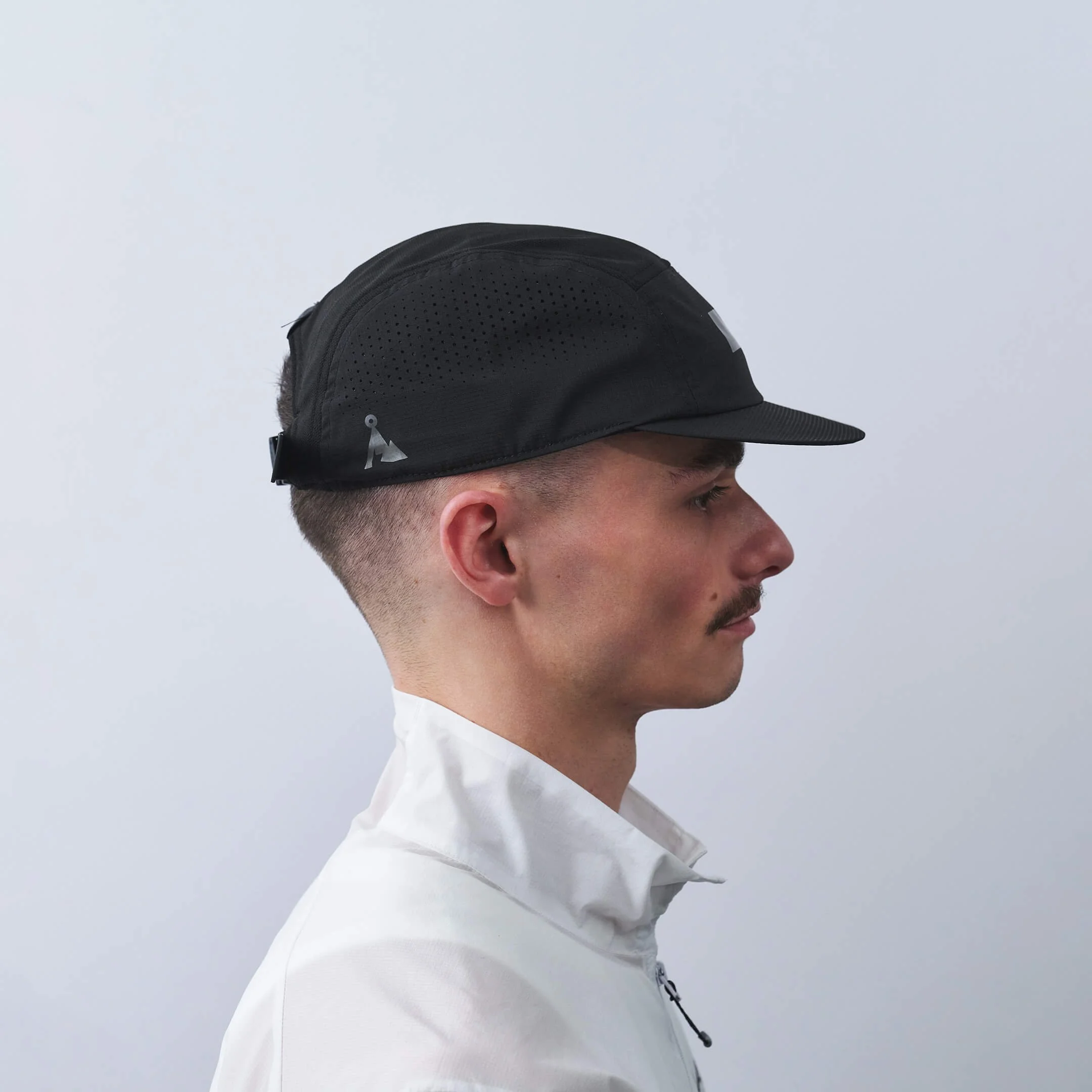 vaga-feather-racing-cap-black-model-profile.jpg