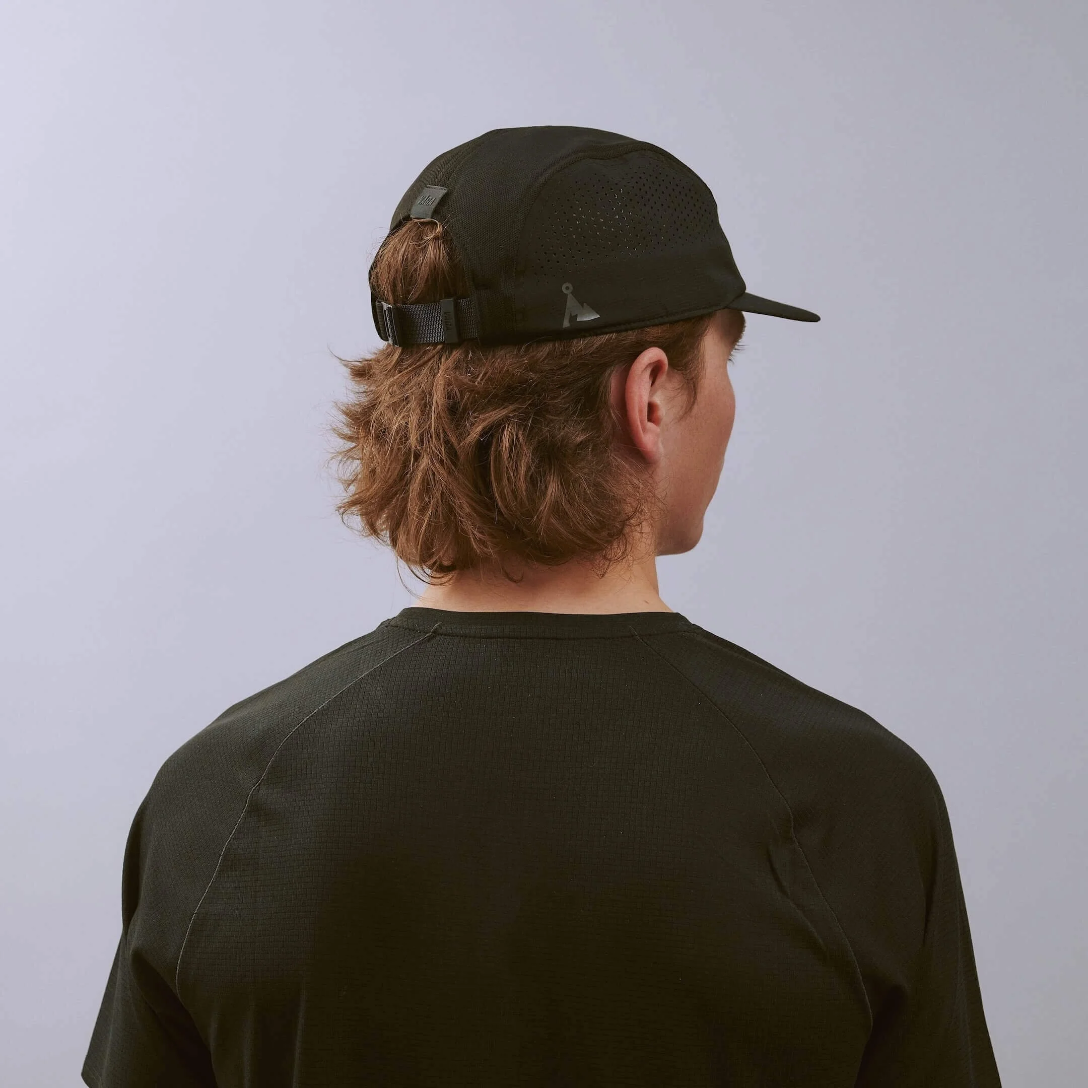 vaga-feather-racing-cap-black-model-angle.jpg
