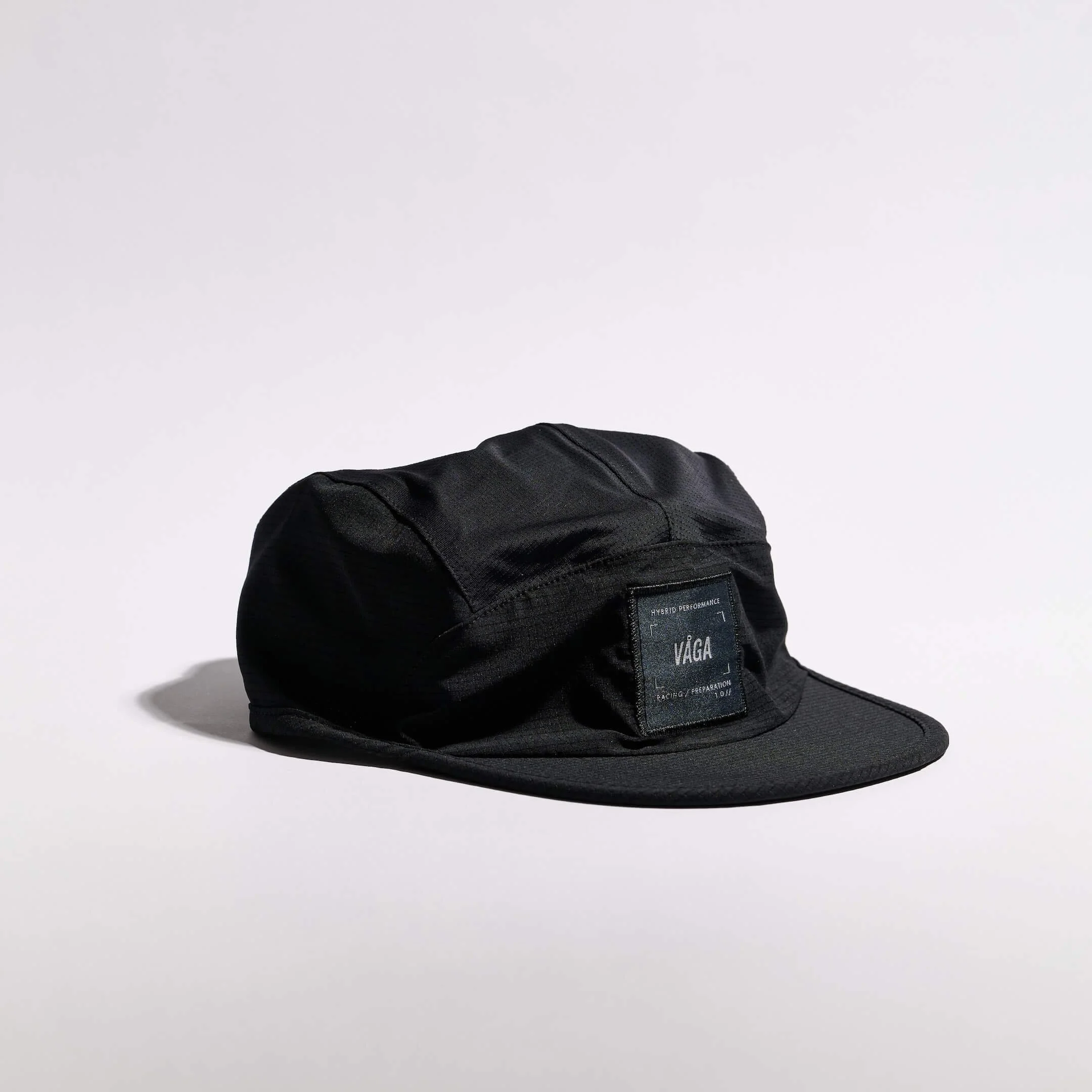 vaga-transit-lite-cap-unstructured-running-cap-black-angle.jpg