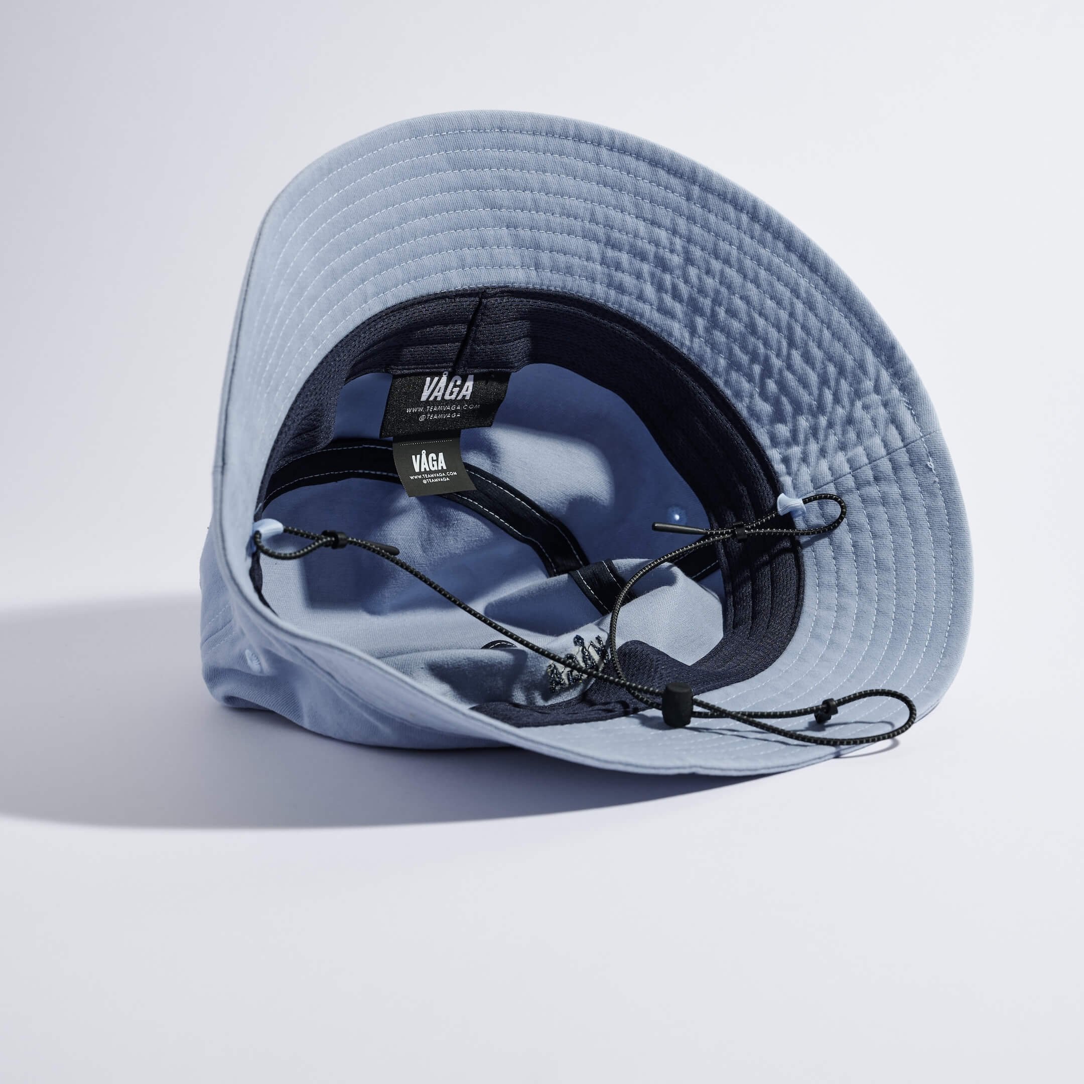 vaga-washed-cotton-bucket-hat-postalblue-underneath.jpg