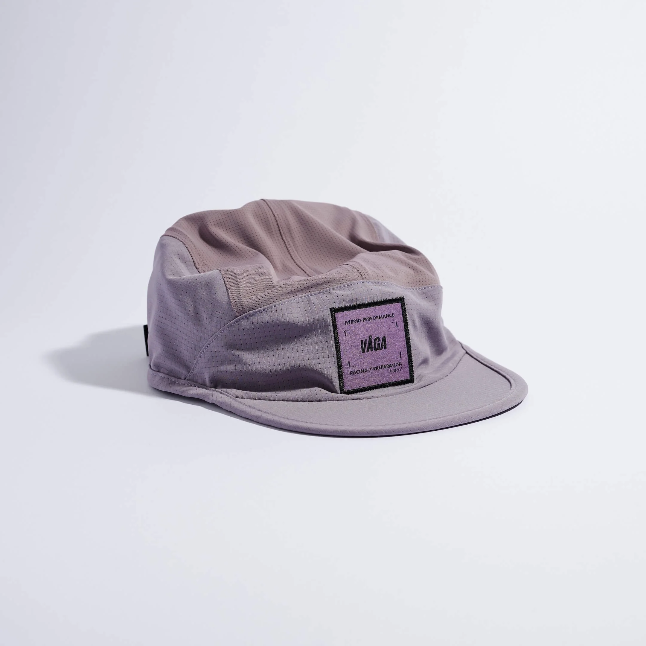 vaga-transit-lite-cap-unstructured-running-cap-mauve-angle.jpg