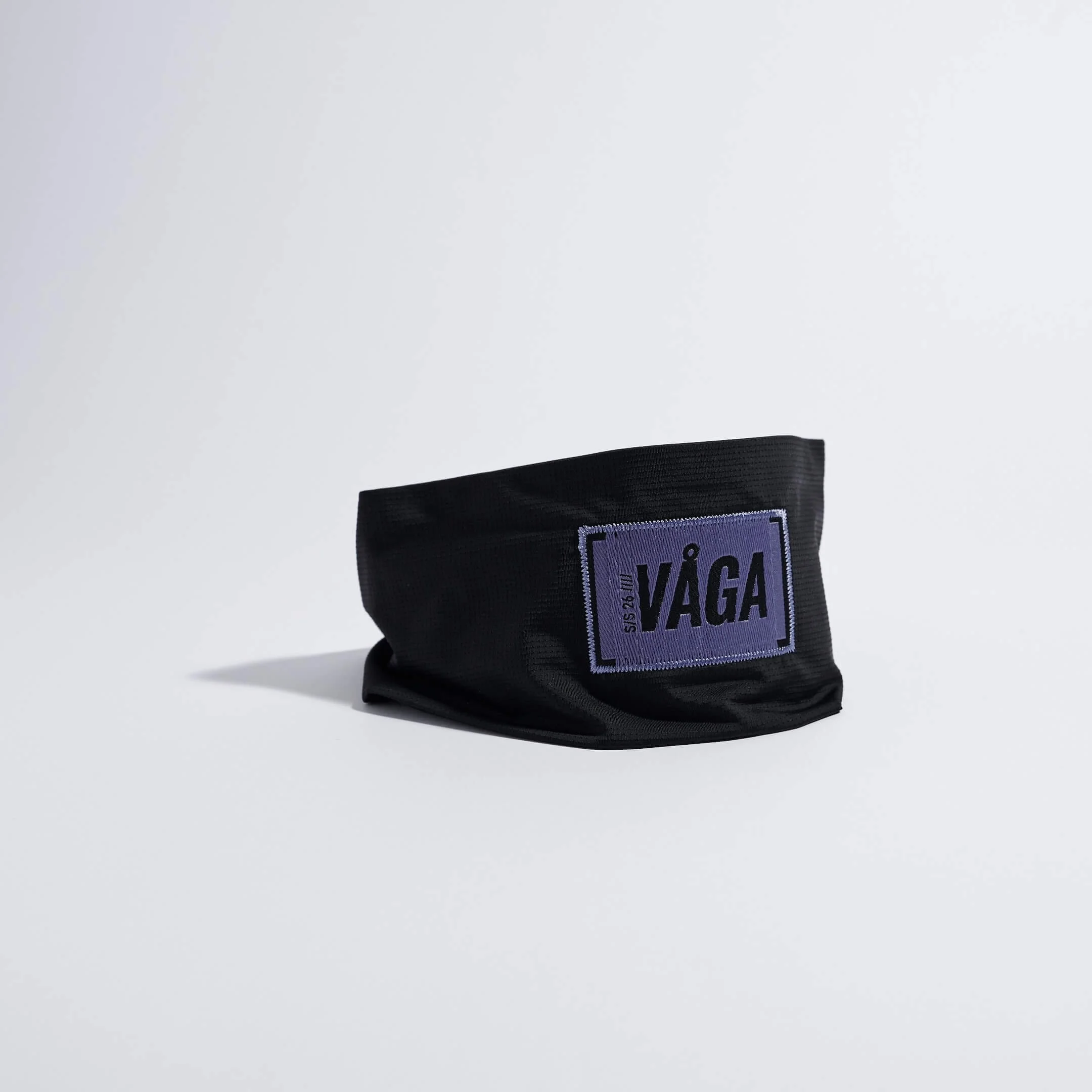 vaga-lightweight-mesh-running-headband-black-stood.jpg