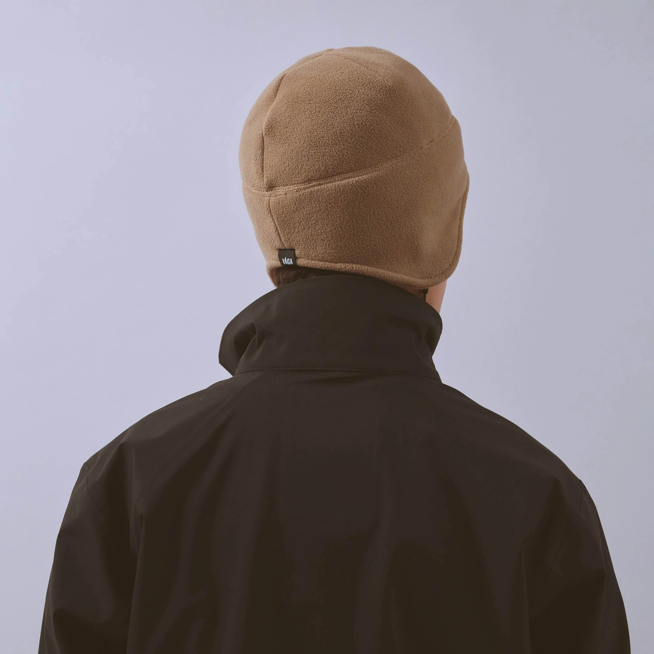 vaga-fleece-summit-beanie-running-hat-taupe-model-back-angle.jpg
