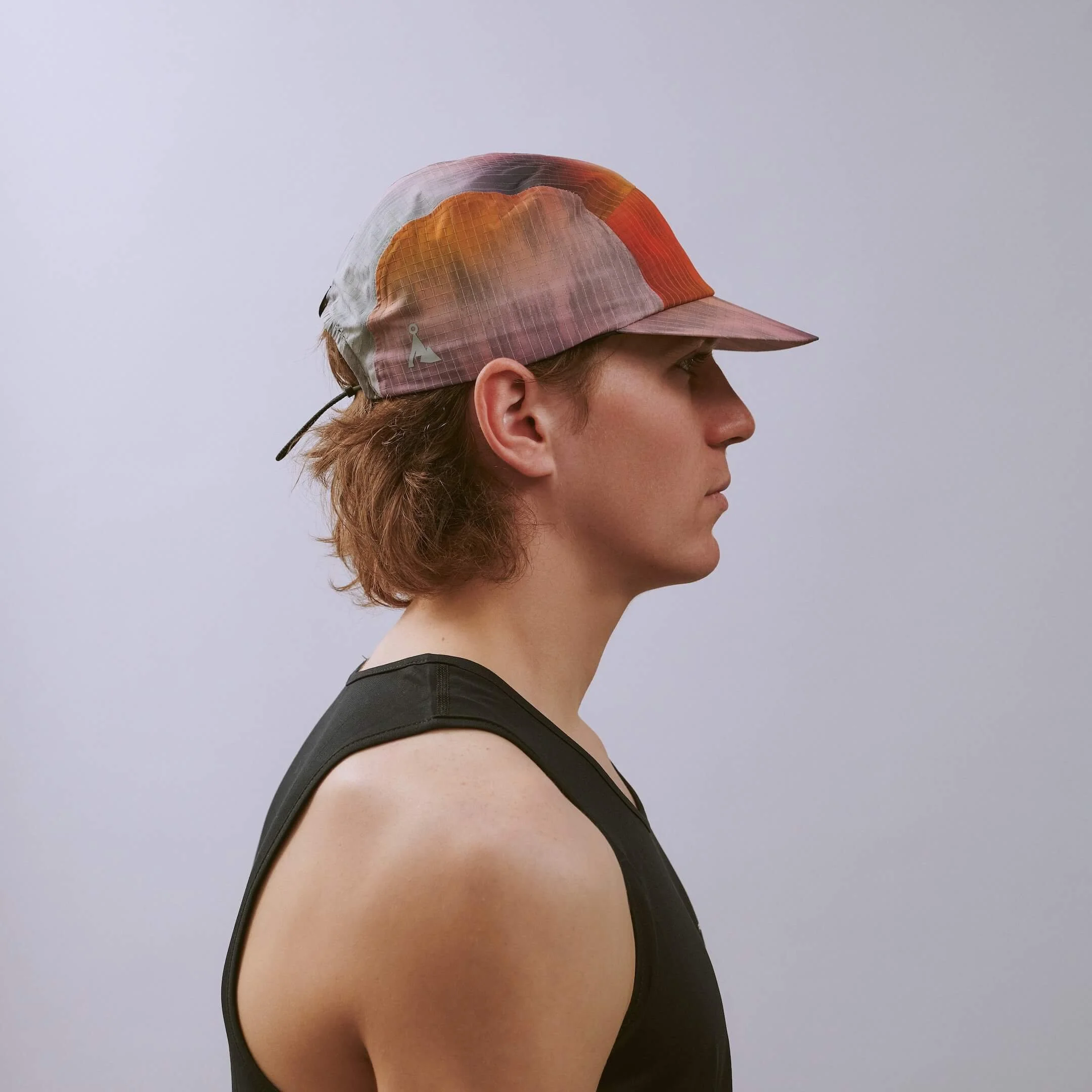 vaga-night-club-reflective-running-cap-sunset-e-model-profile.jpg
