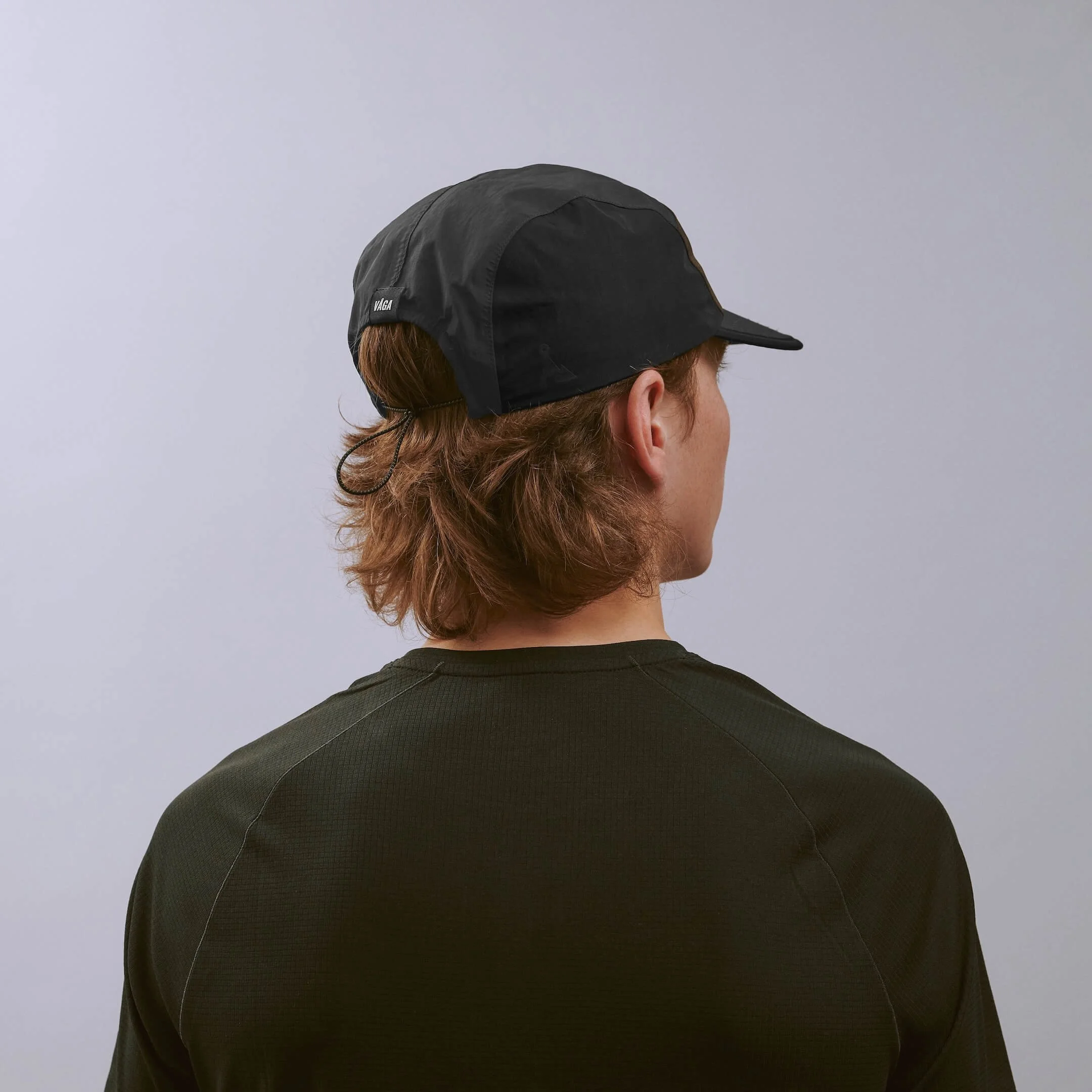 vaga-pacer-running-cap-charcoal-black-brown-model-back-angle.jpg