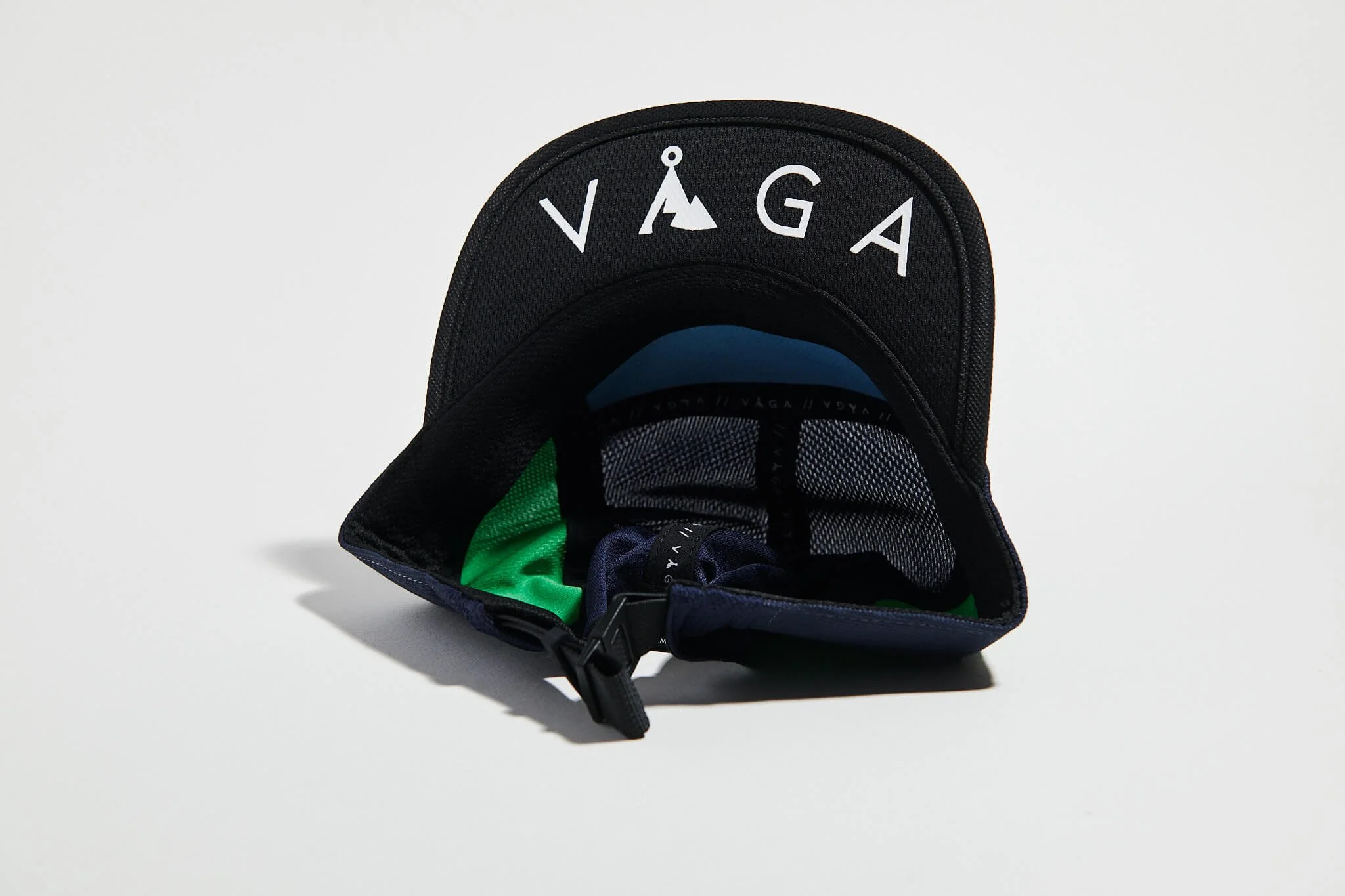 våga-club-cap-navy-blue-bright-green-neon-pink-black-underneath.jpg