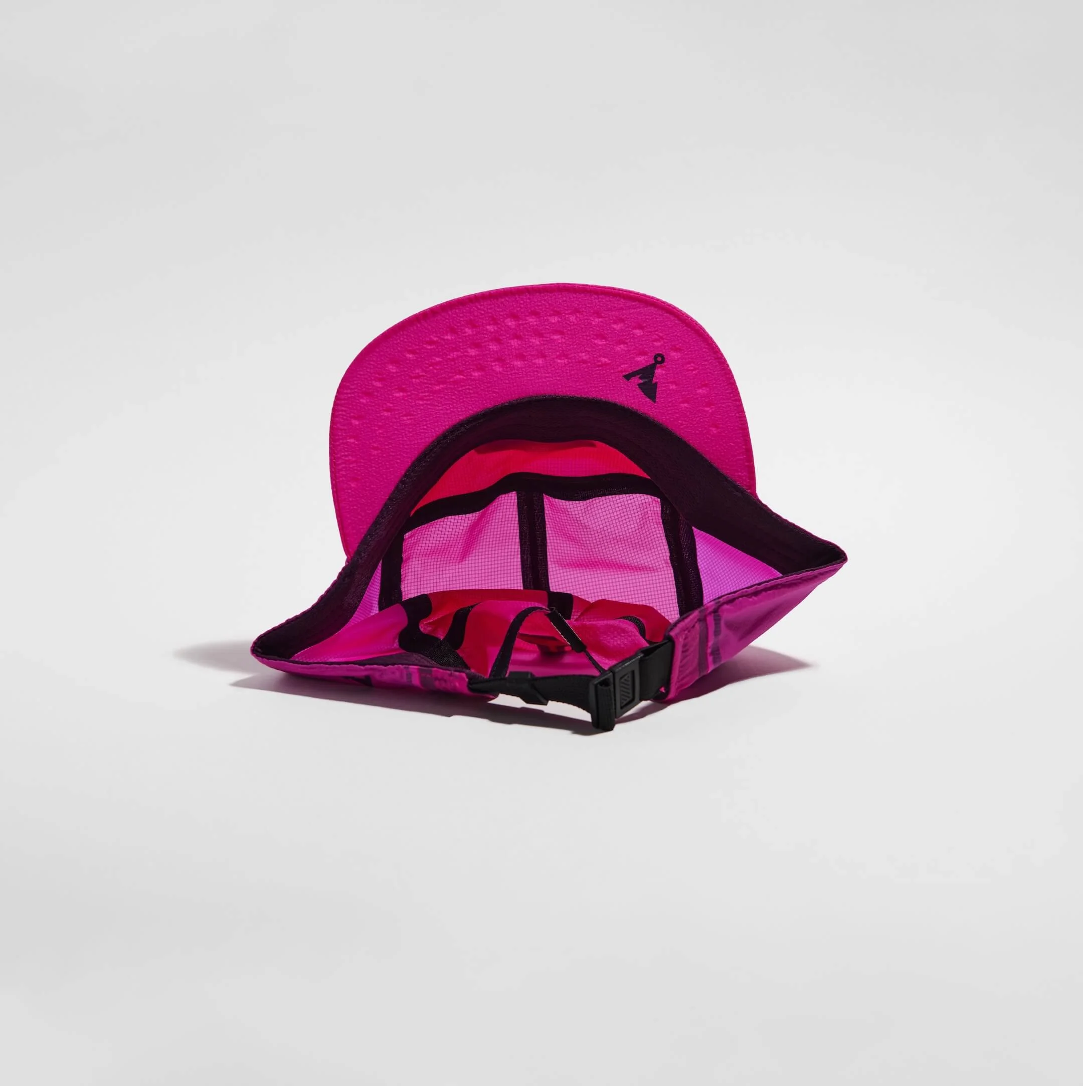 vaga-feather-light-cap-running-cap-fuschia-underneath.jpg