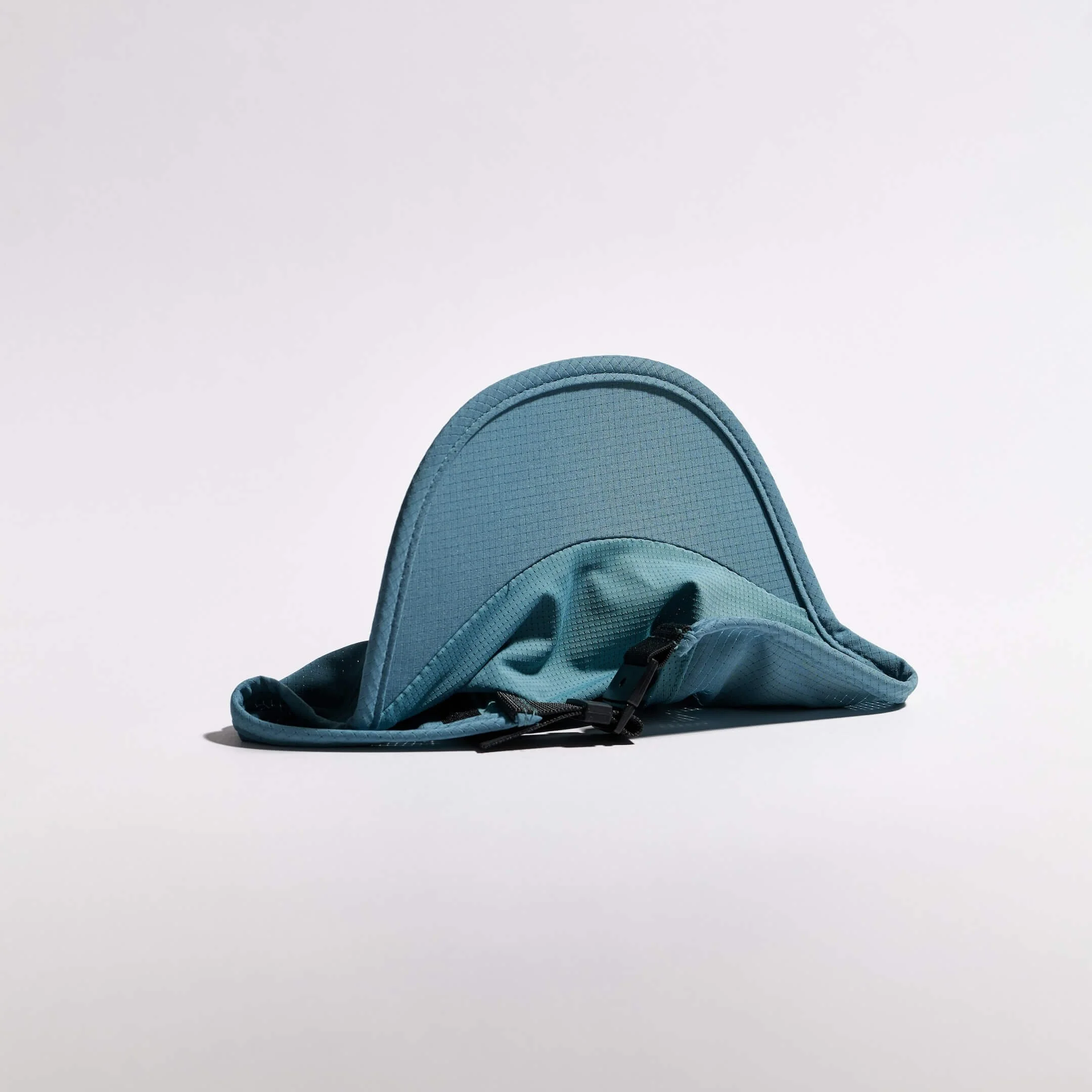 vaga-transit-lite-cap-unstructured-running-cap-teal-underside.jpg