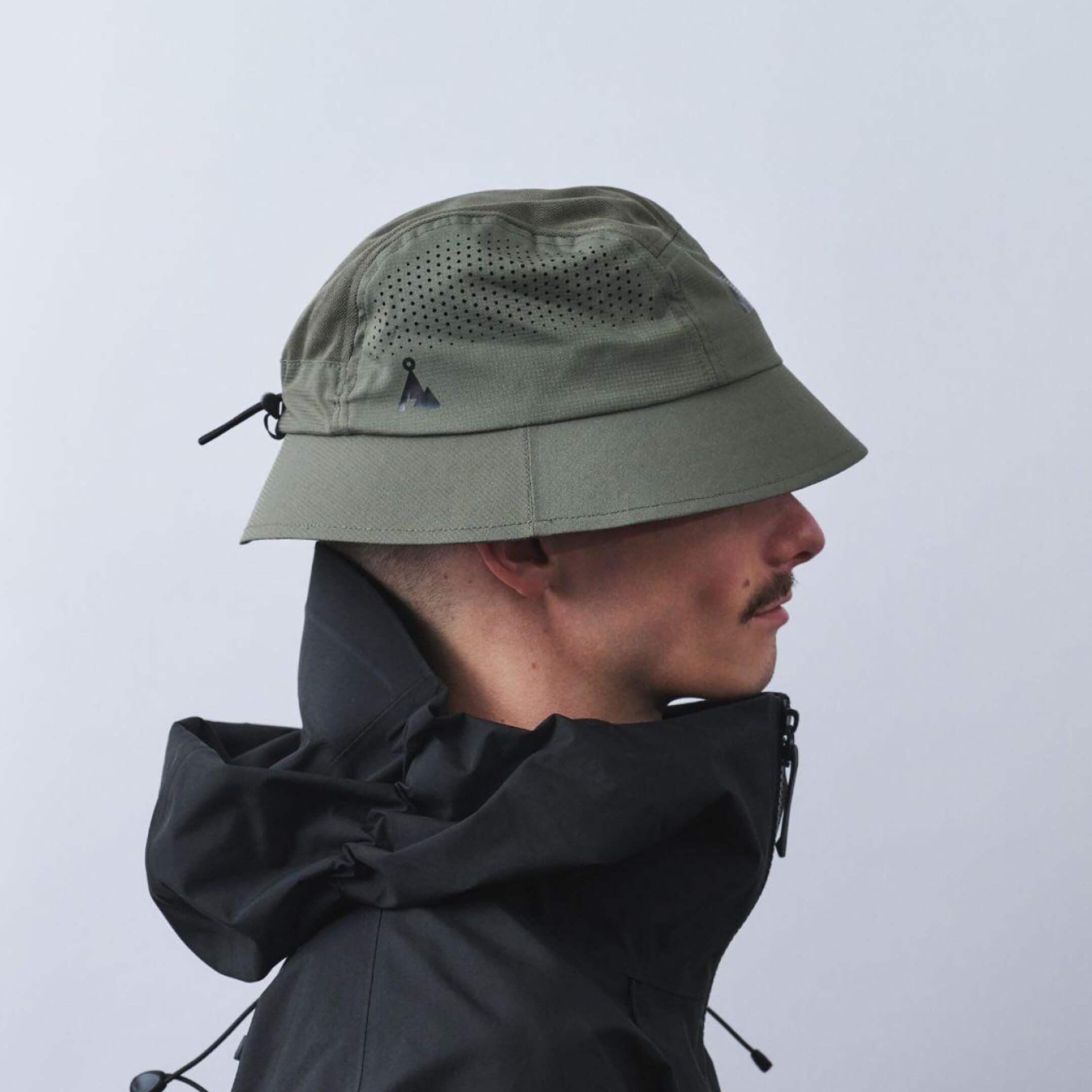 vaga-feather-racing-bucket-hat-taupe-model-side-profile.jpg