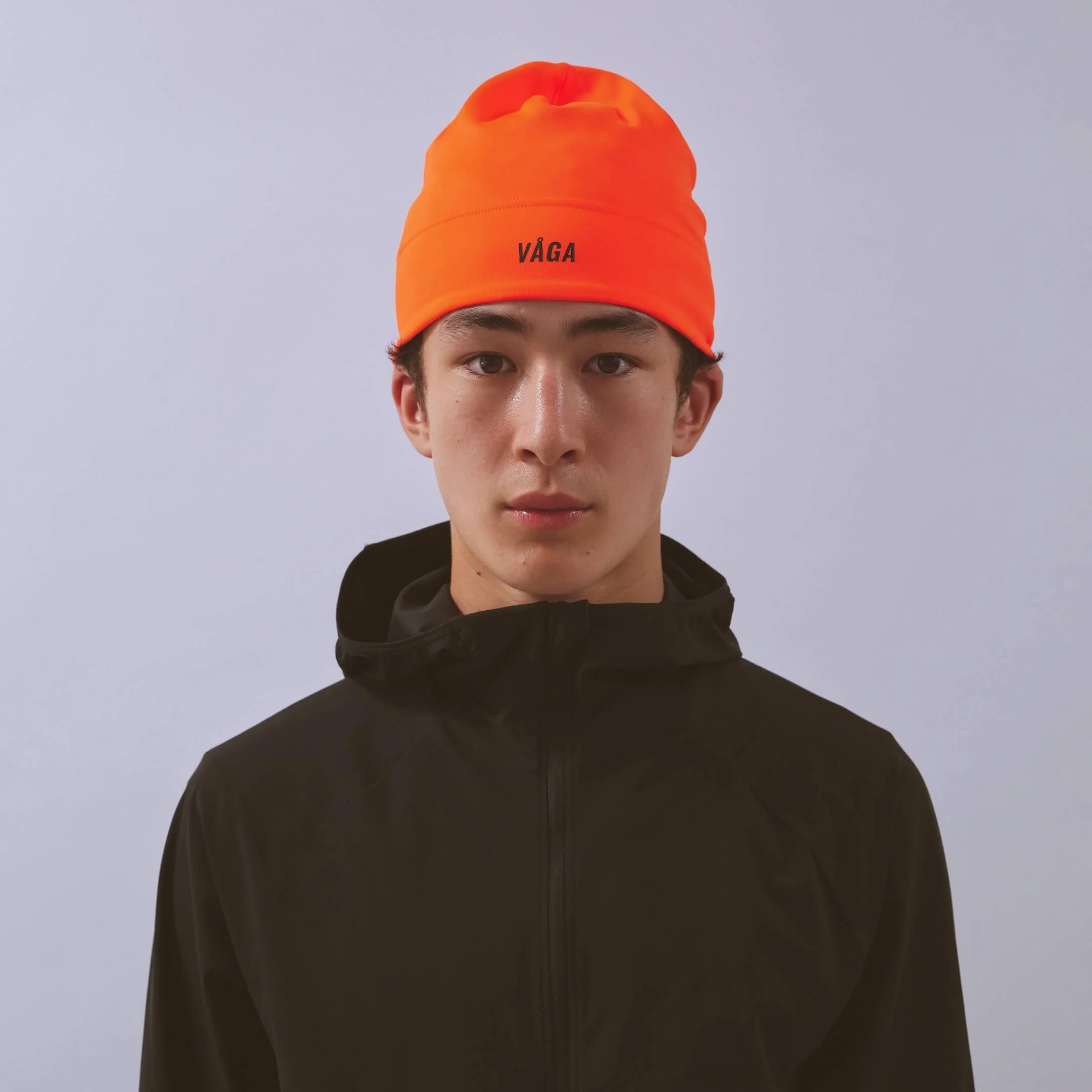 vaga-performance-skull-cap-running-hat-neonorange-model-front.jpg