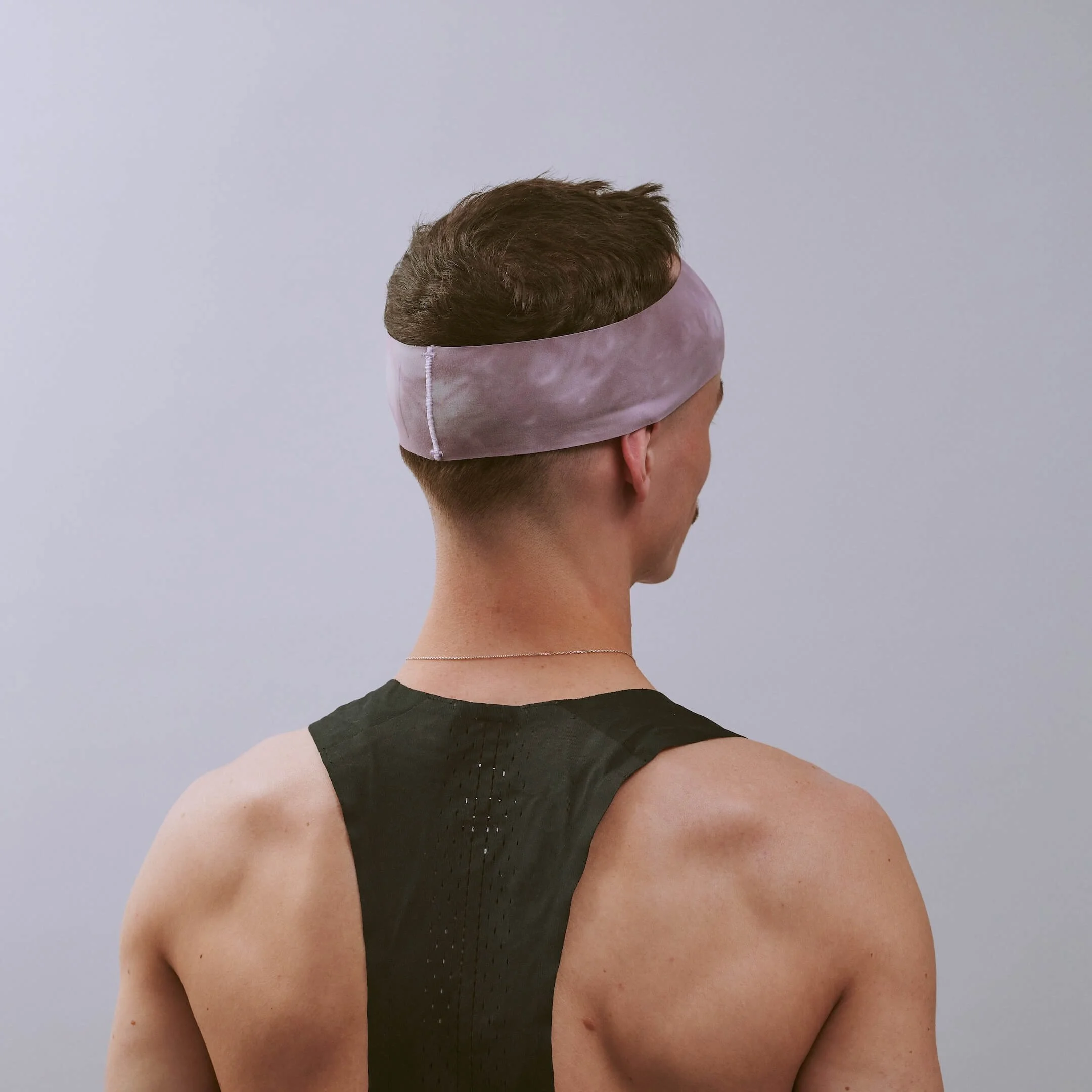 vaga-tie-dye-running-headband-purple-pink-offwhite-r-model-angle.jpg