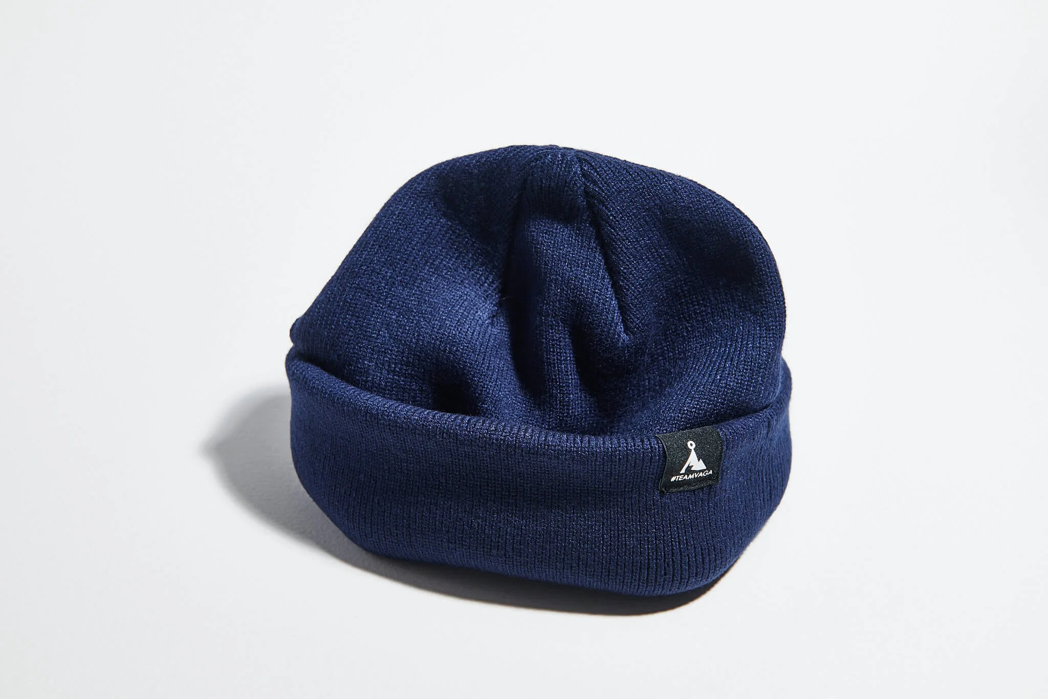 våga-fine-rib-beanie-navy-blue-rolled.jpg
