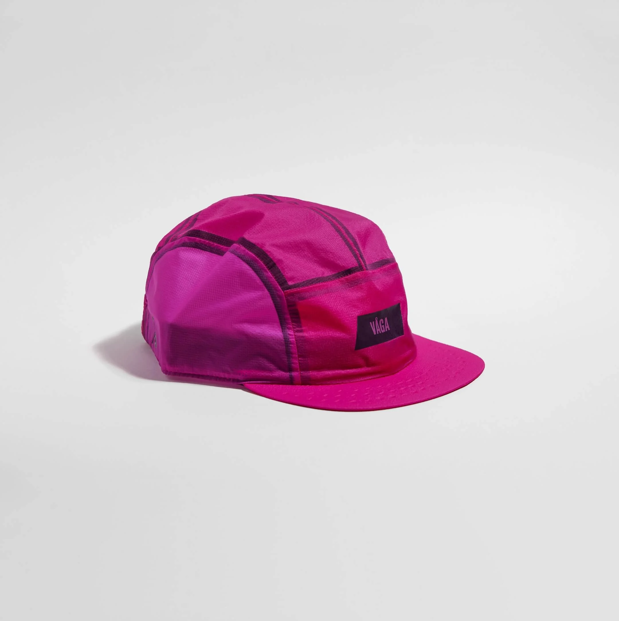 vaga-feather-light-cap-running-cap-fuschia-angle.jpg