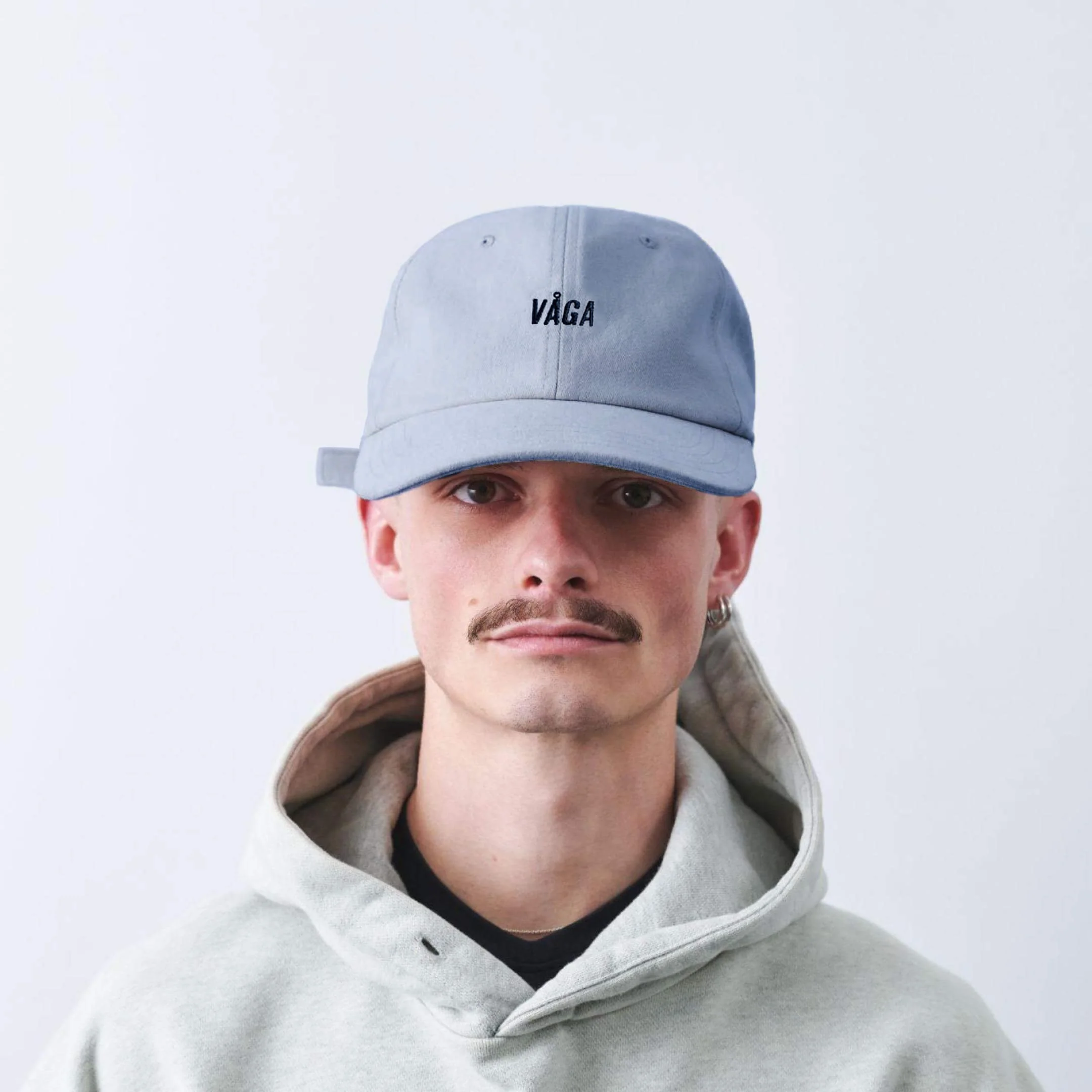 vaga-washed-cotton-cap-postalblue-model-front.jpg