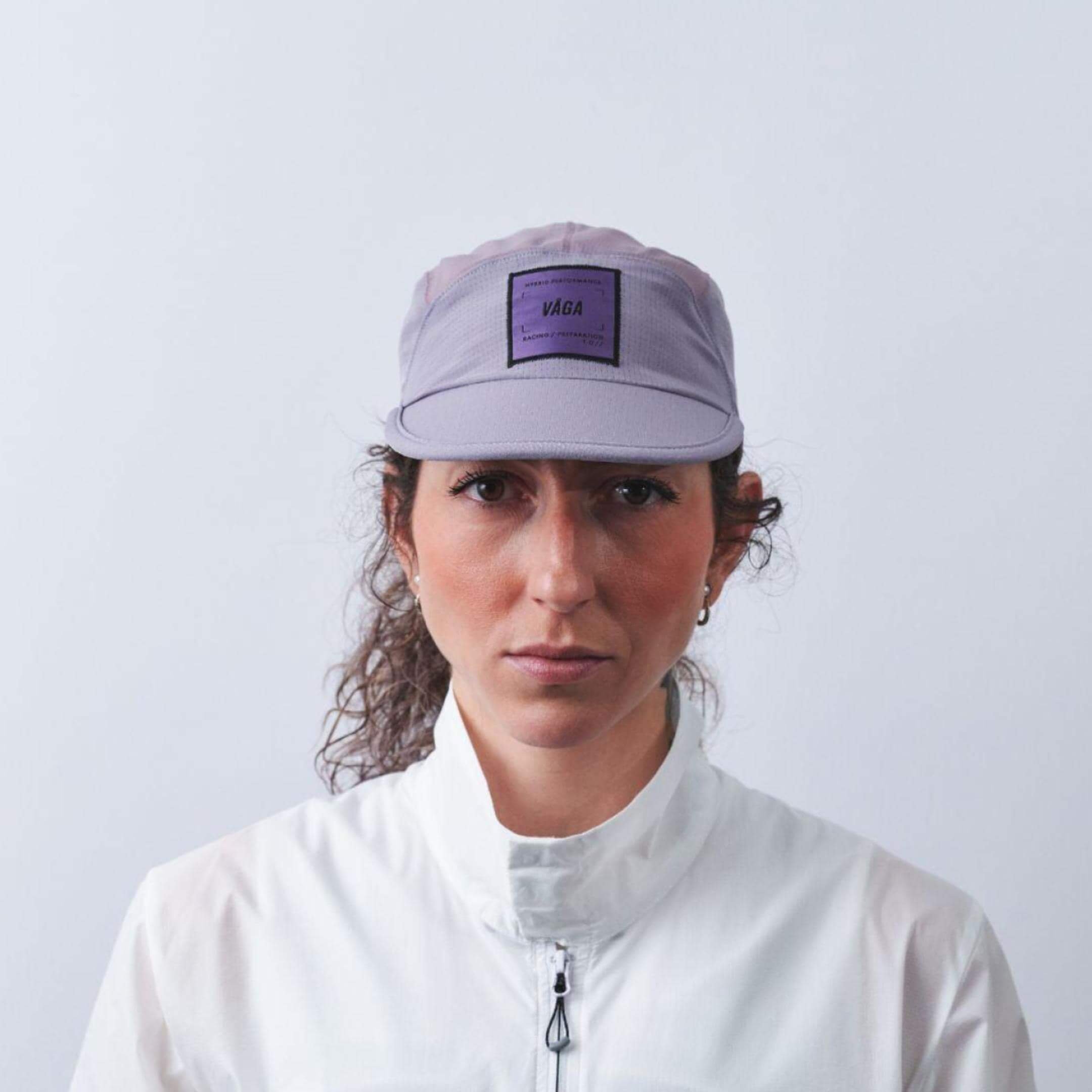 vaga-transit-lite-cap-unstructured-running-cap-mauve-model-front.jpg