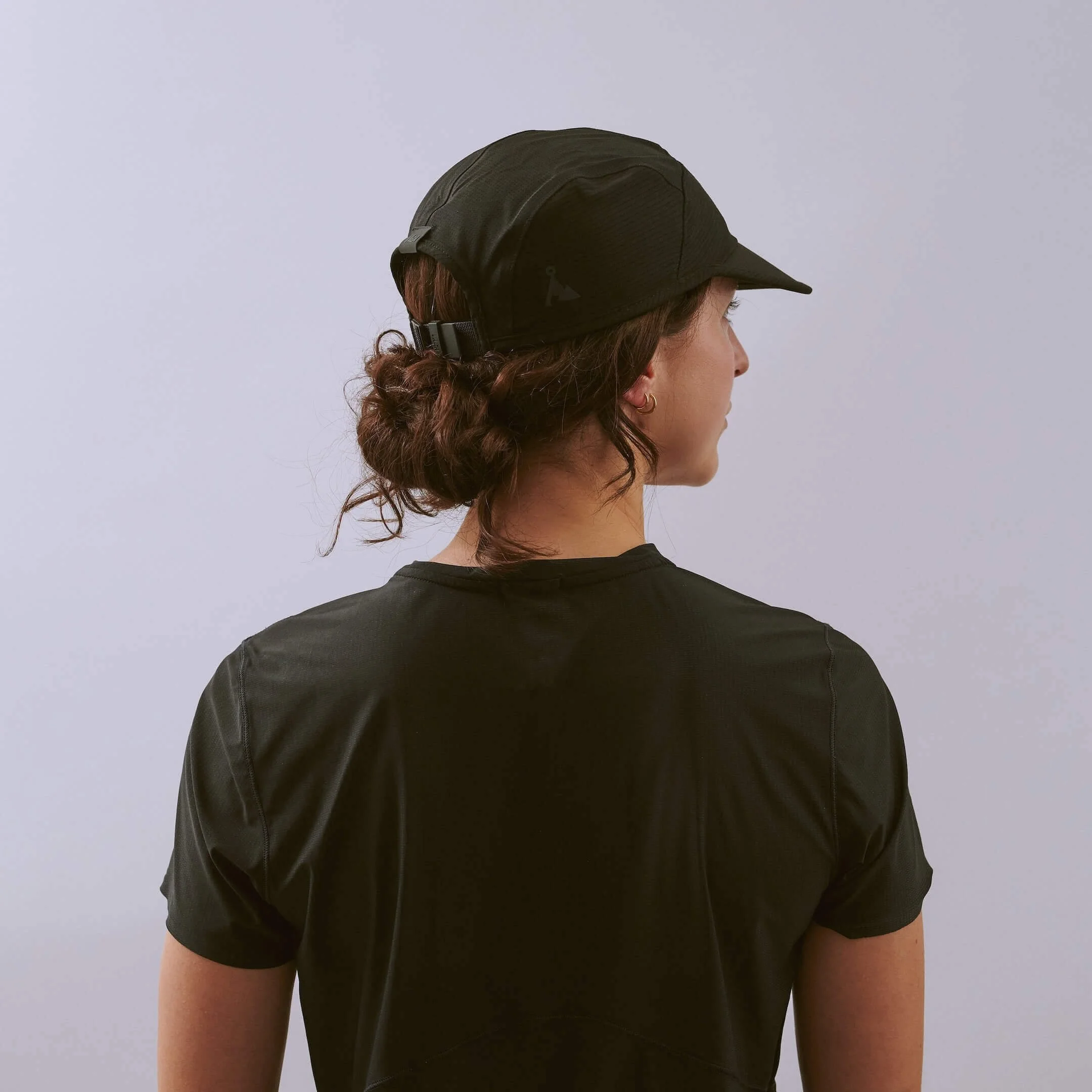 vaga-transit-lite-cap-unstructured-running-cap-black-l-model-angle.jpg