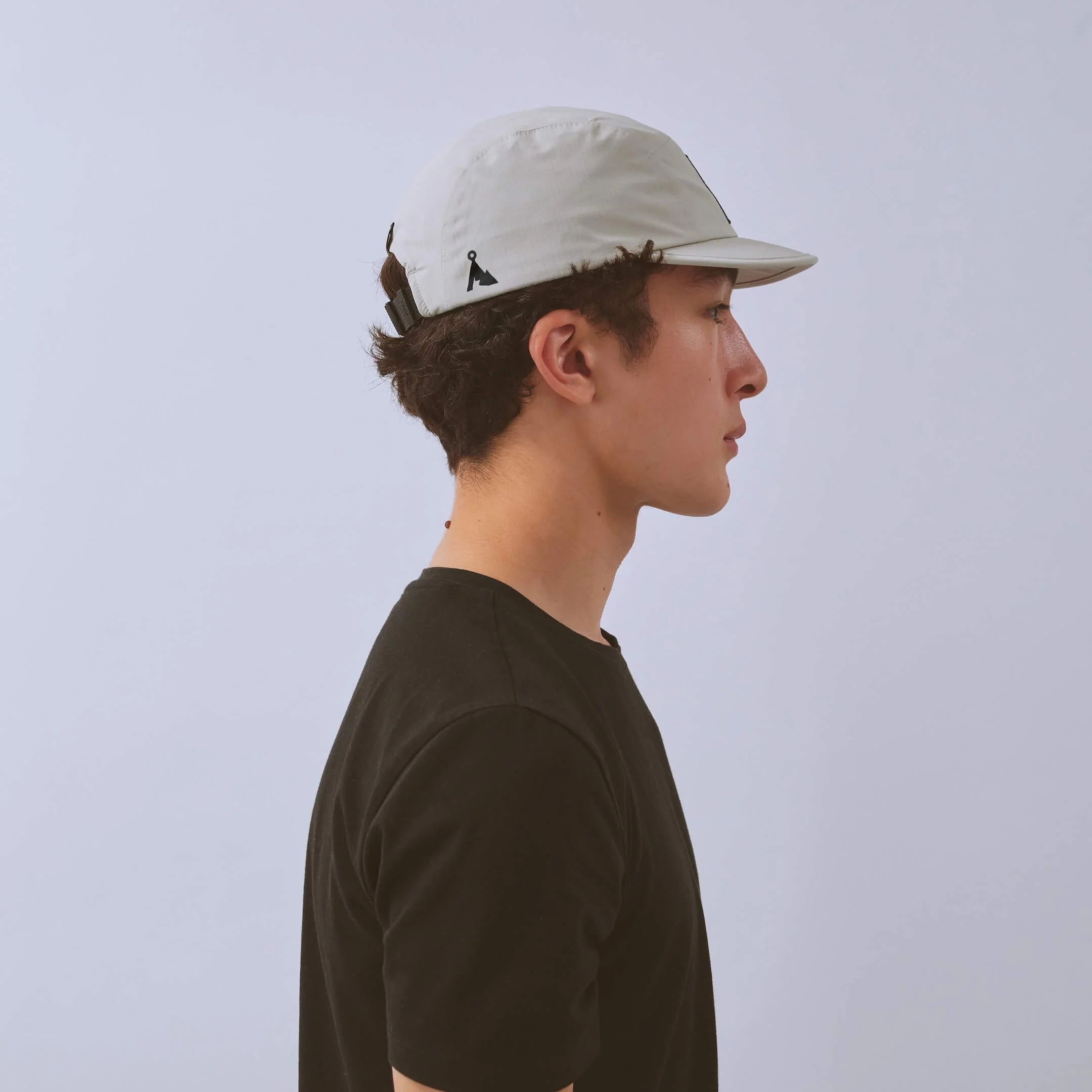 vaga-waterproof-fell-cap-running-cap-stone-model-profile.jpg