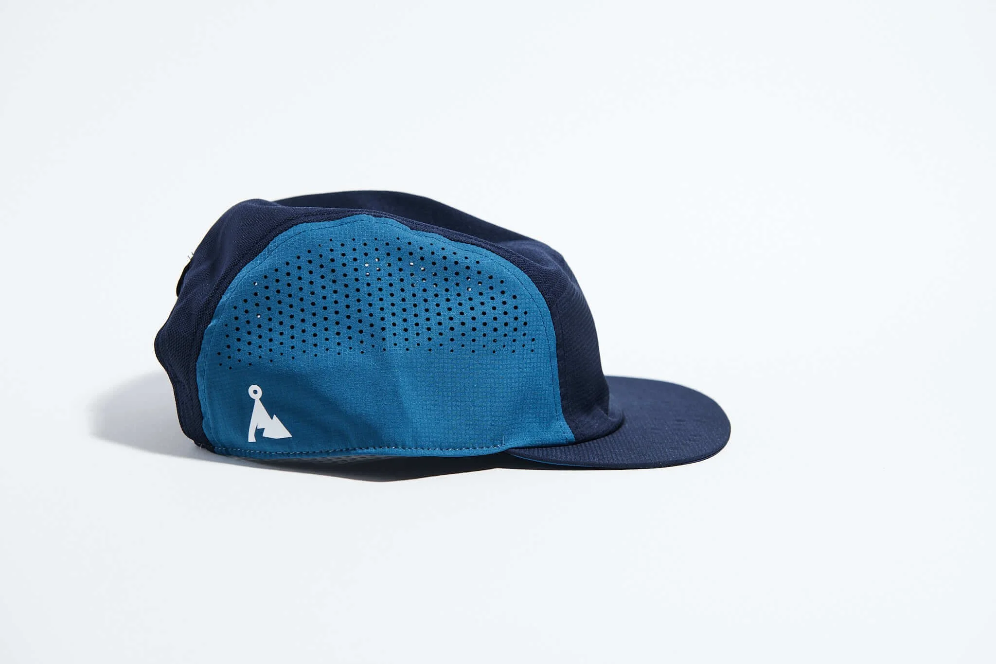våga-feather-racing-cap-teal-navy-blue-side.jpg