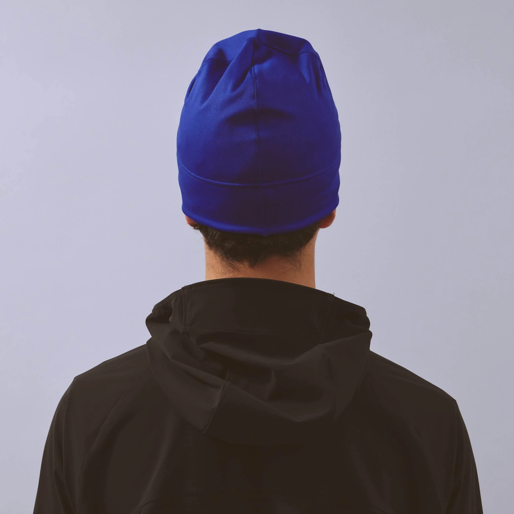 vaga-performance-skull-cap-running-hat-electricblue-model-back.jpg
